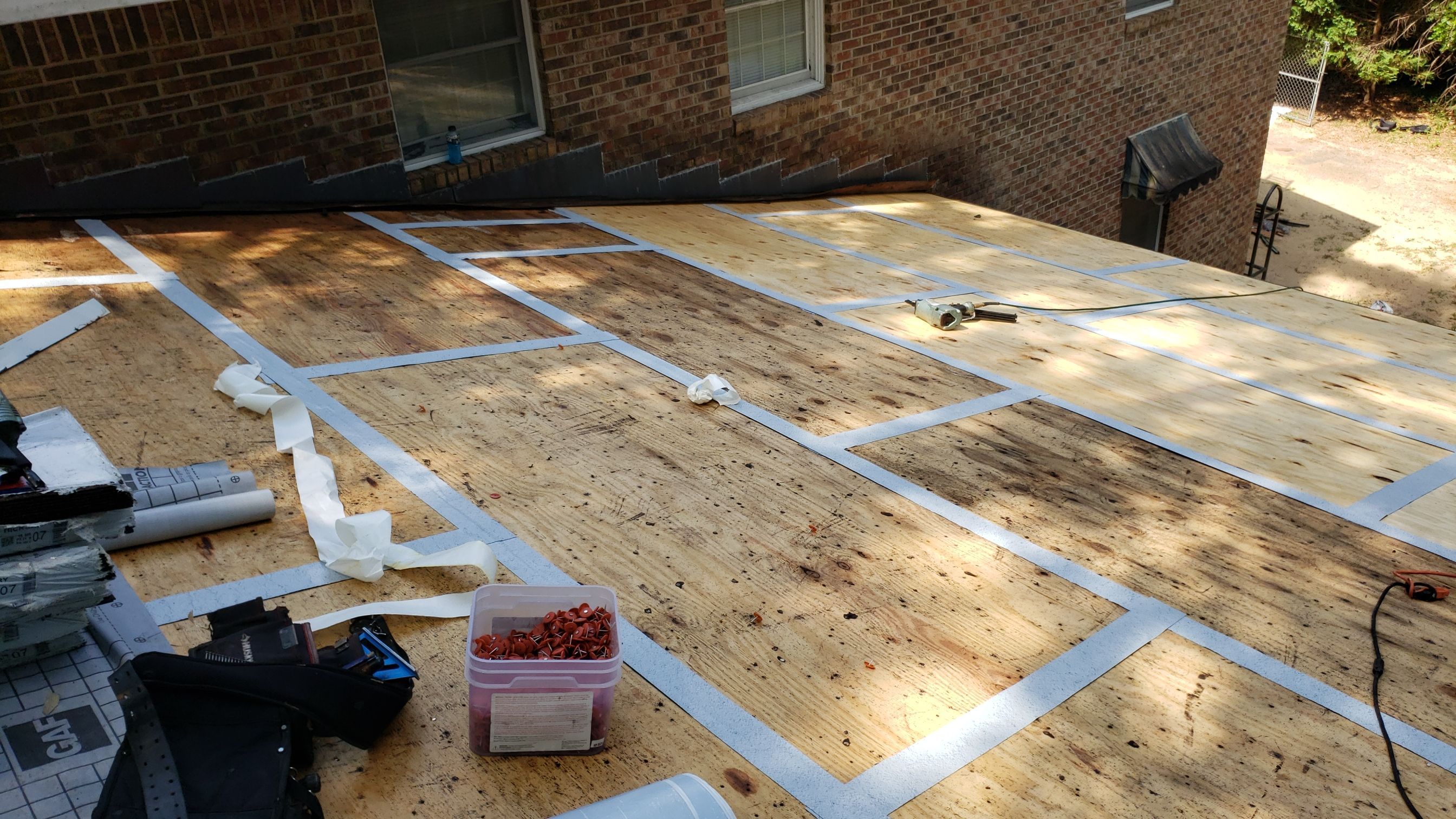 Residential Roofing Installation using Roof Replacement by American Roofing & Construction LLC