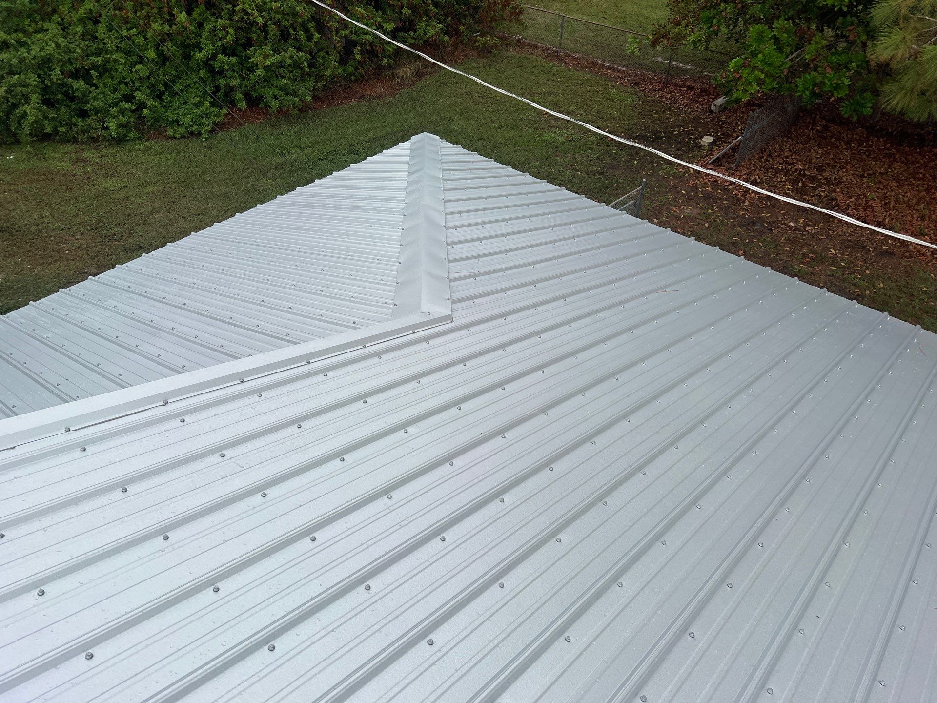 Residential Roofing Installation using Durabull Classic Rib Panel by Durabilis Roofing INC