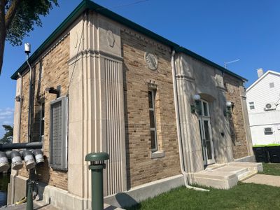 Gutter and Gutter Screen Installation for Traverse City Masonry Building