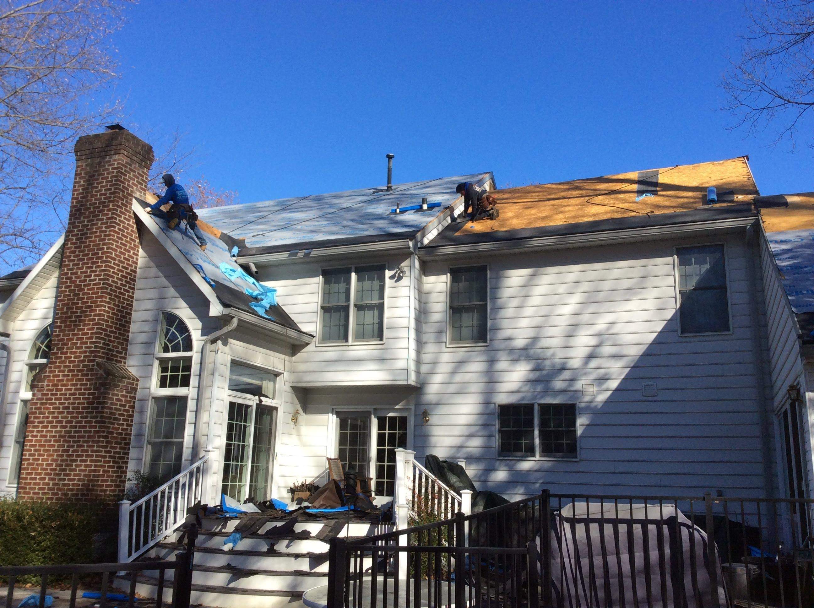 Residential Roofing Installation using Charcoal Black by Alpha Design Services