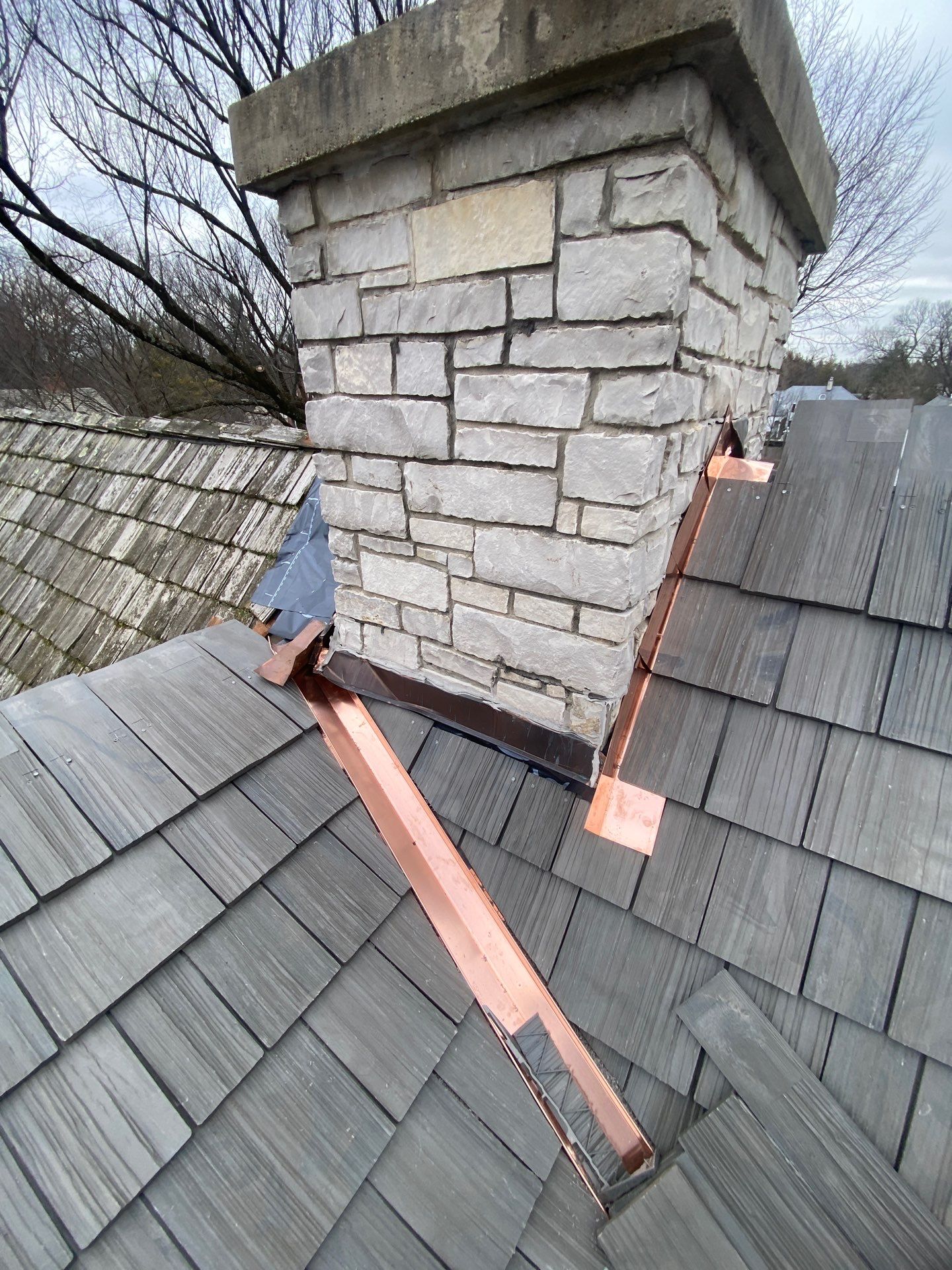 Brava Shake Tile Roof Installment with Copper Flashings by Custom Installations