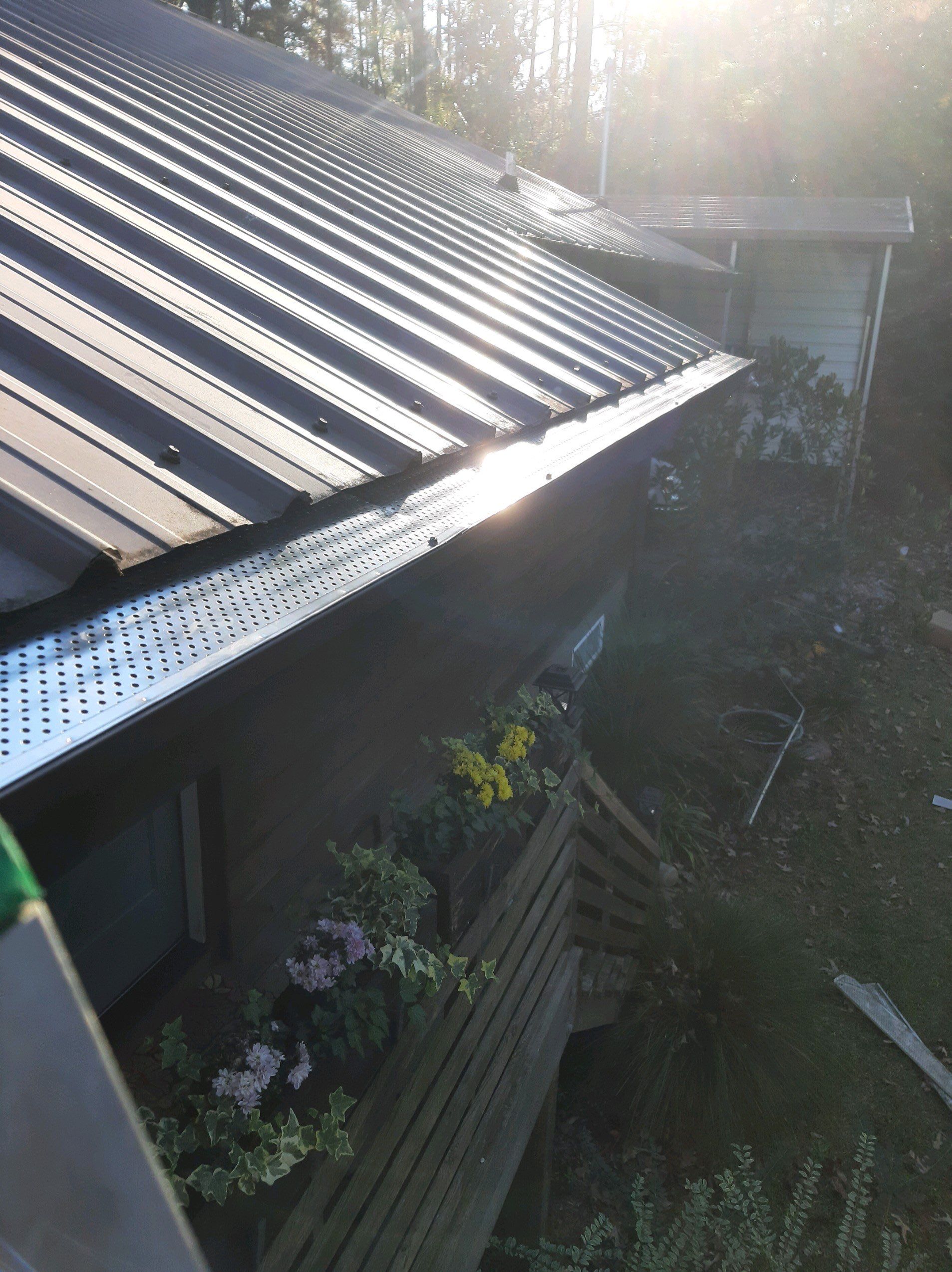 Gutter Installation using Royal Brown K-Style Seamless Gutters and LeafBlaster Pro Gutter Guards by Gutter Professors