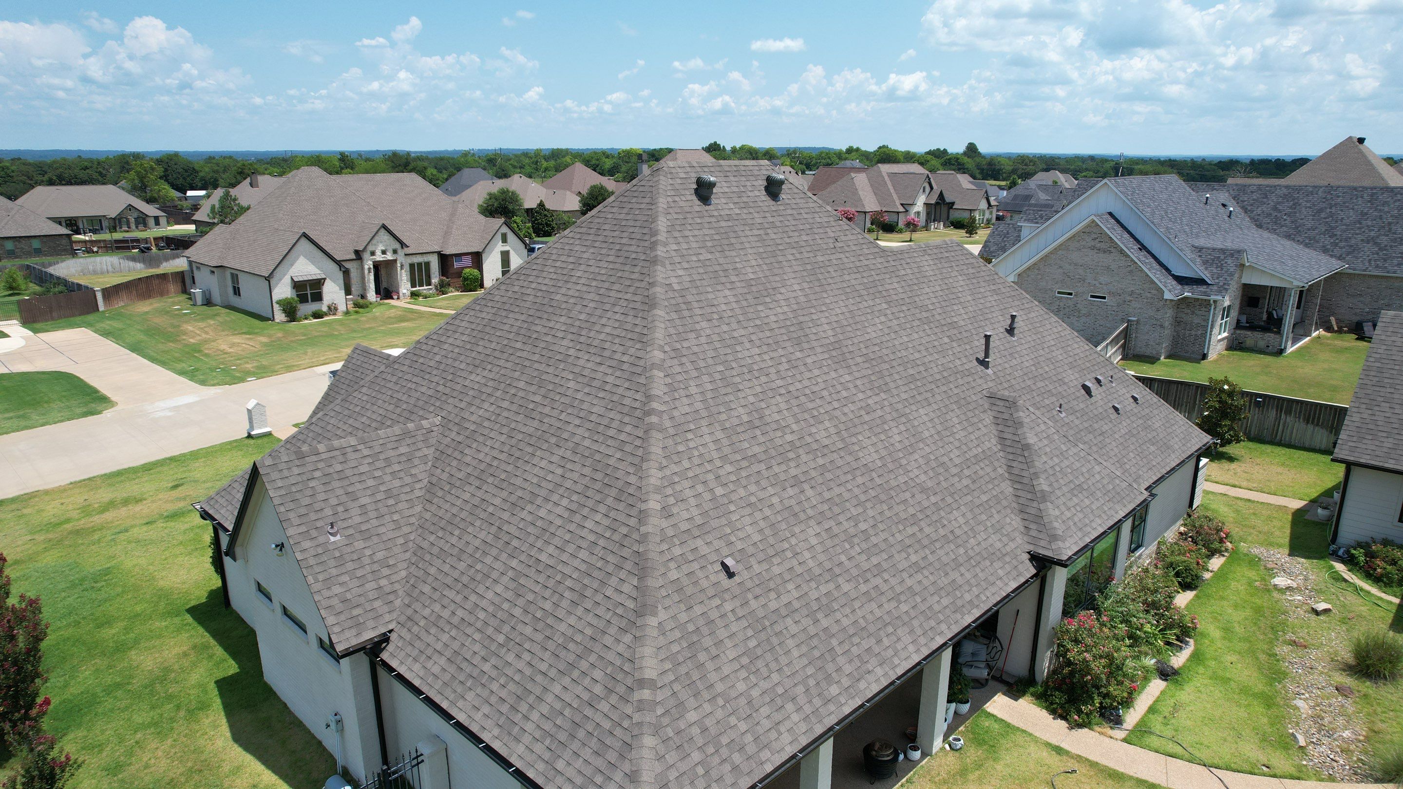 Architectural Shingle and Standing Seam Metal Roof Installation in Mount Selman by Sky High Roofing