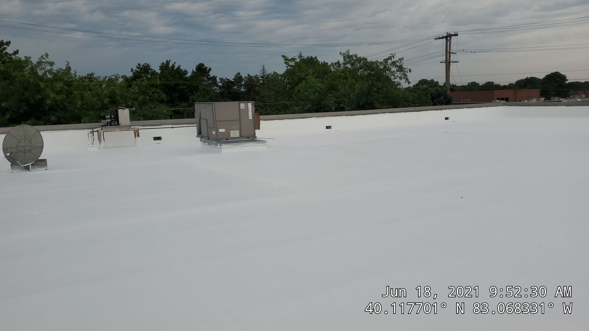 Fabric Reinforced Roof Coating by Gold Star Roofing LLC 