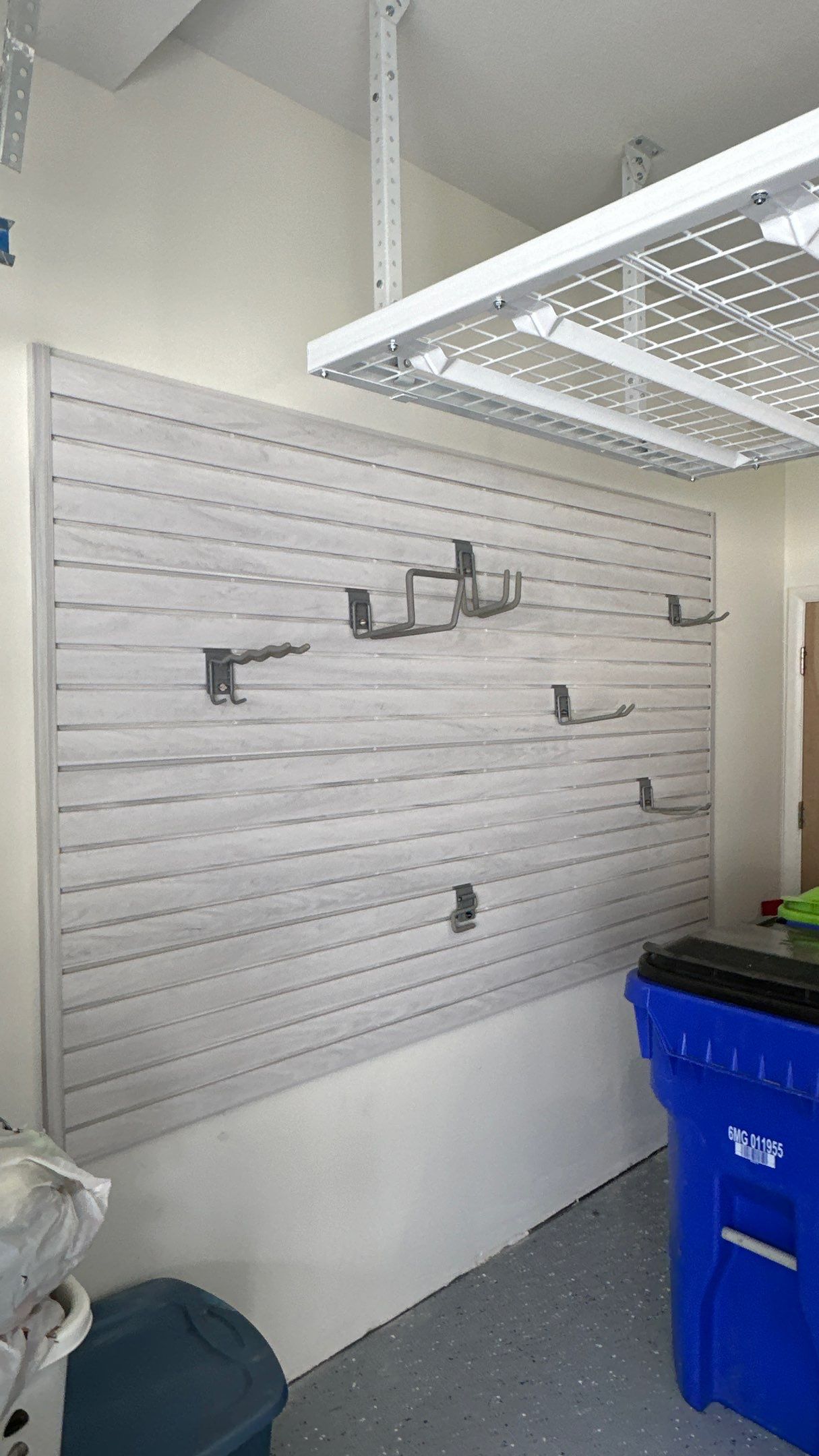Michael M. upgraded his garage with overhead racks and slotwall by Banner Garage