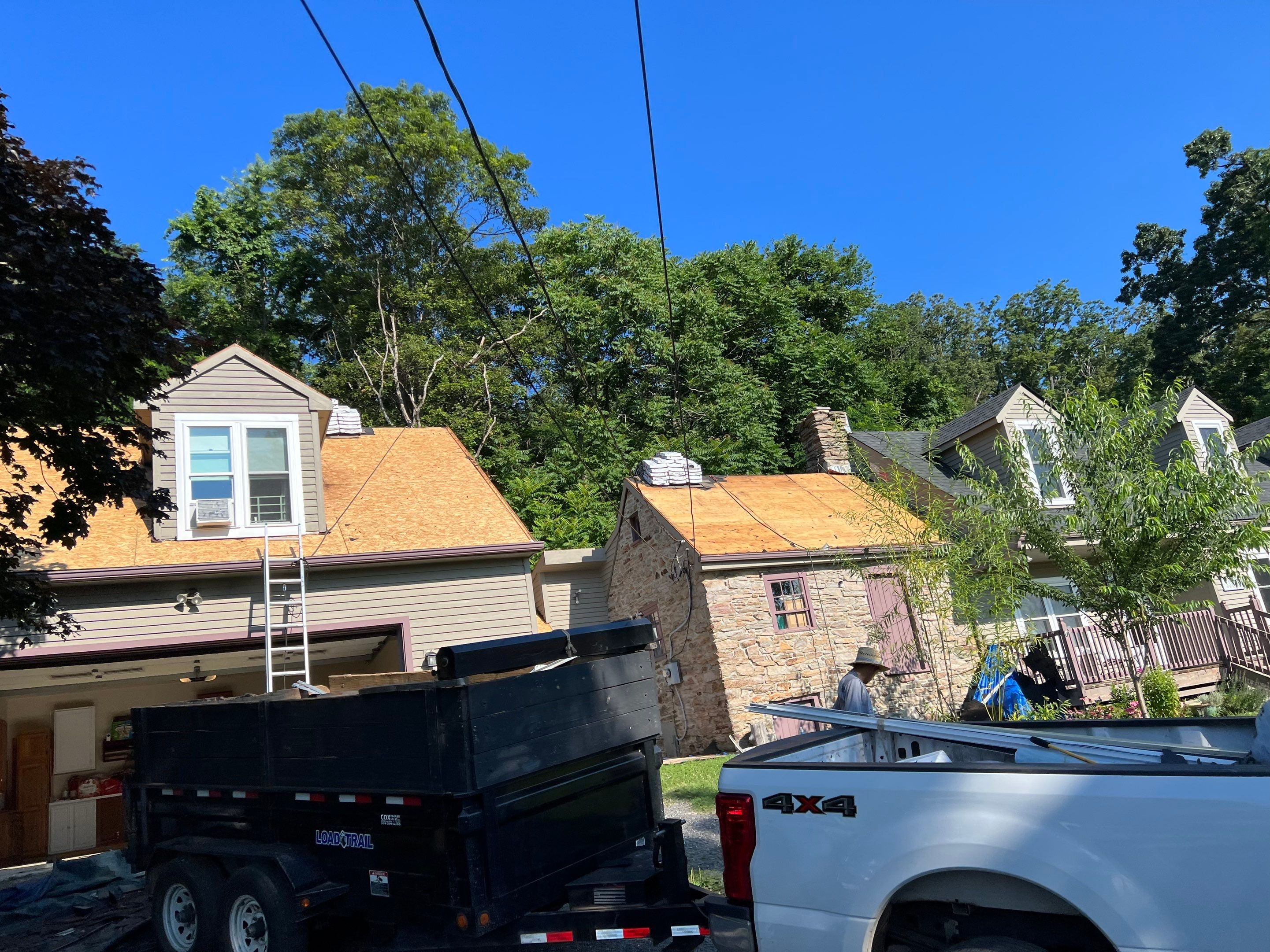 Residential Roofing Installation using Atlas Pinnacle Pristine Black Architectural Shingles by Frederick Roof Repair
