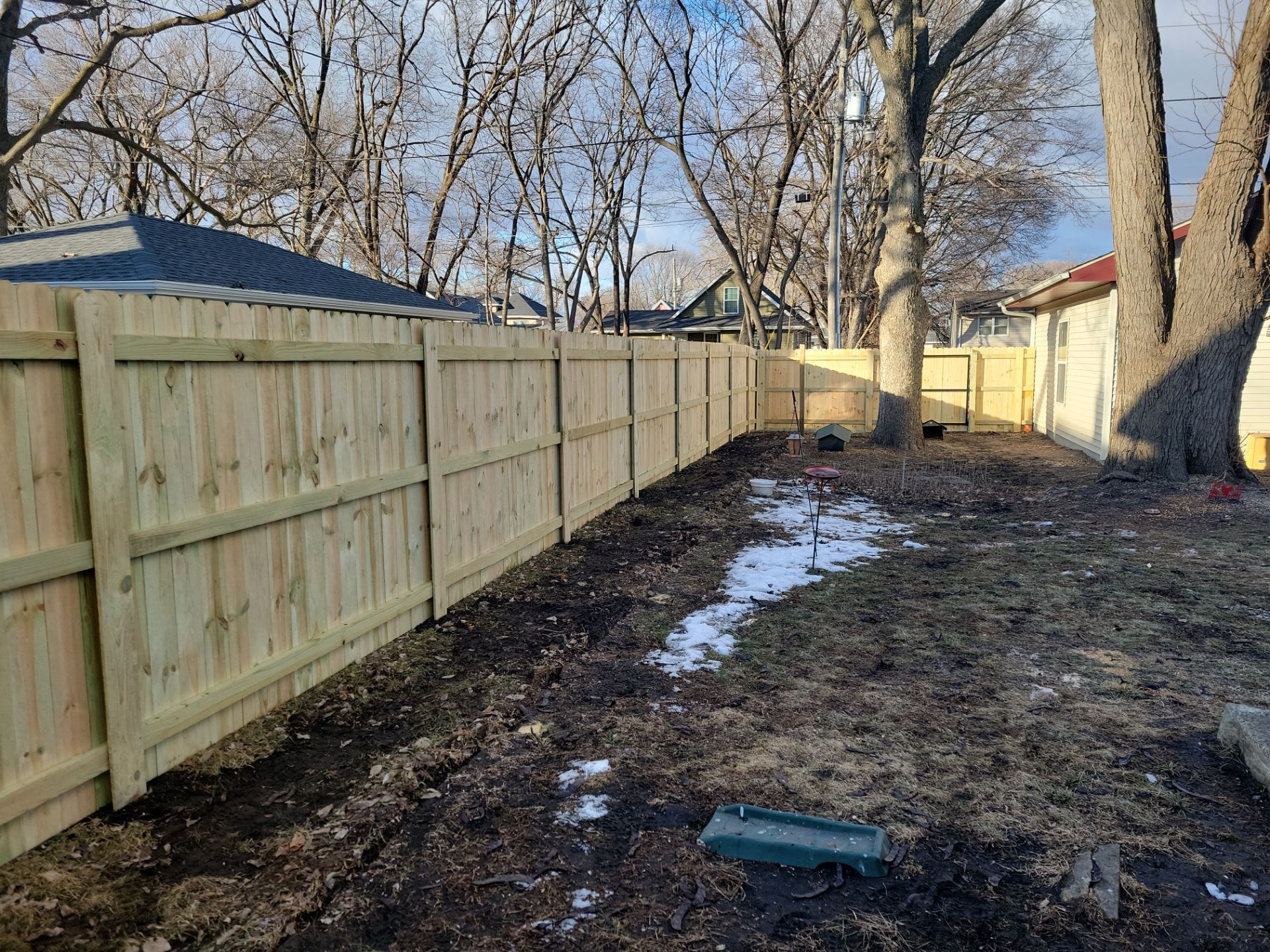 Pressure-Treated Wood Privacy Fence and Double Gate Installation in Waterloo by Perfect Picket Fence and Stain