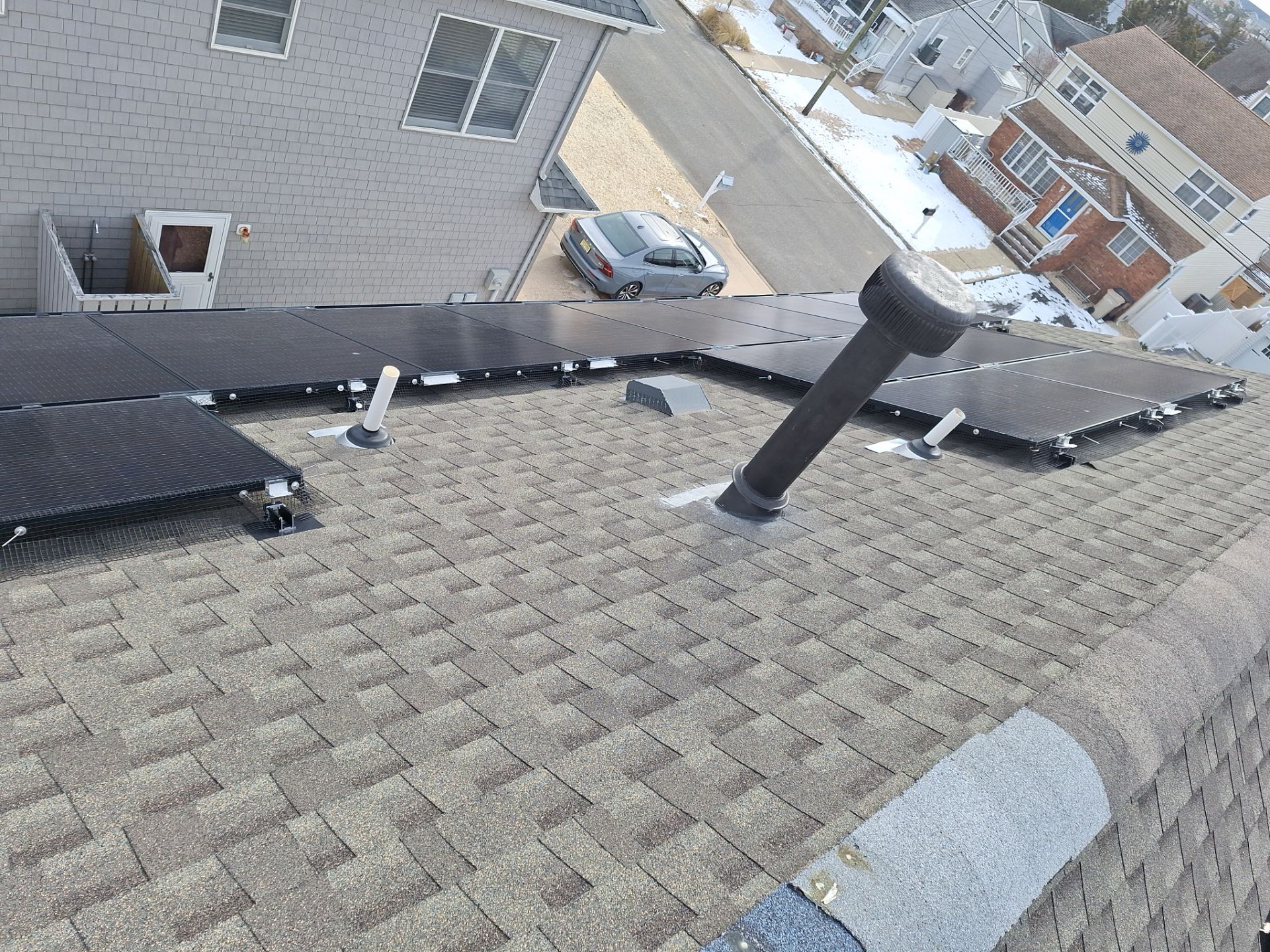 Estate Gray Shingles by Reimagine Roofing