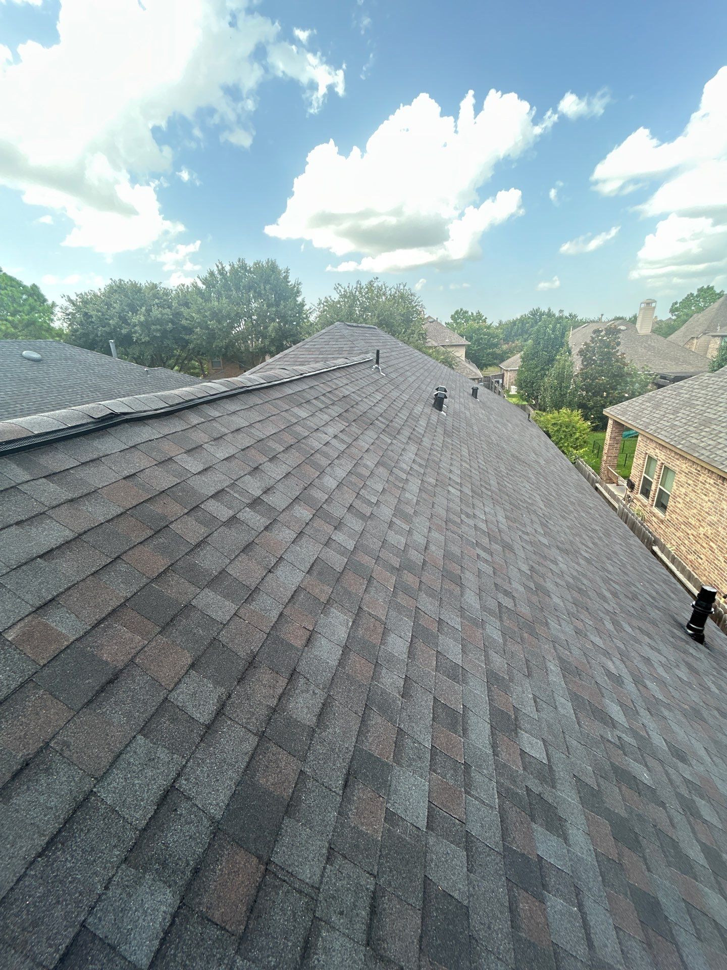 John T by Boss Hogg Roofing
