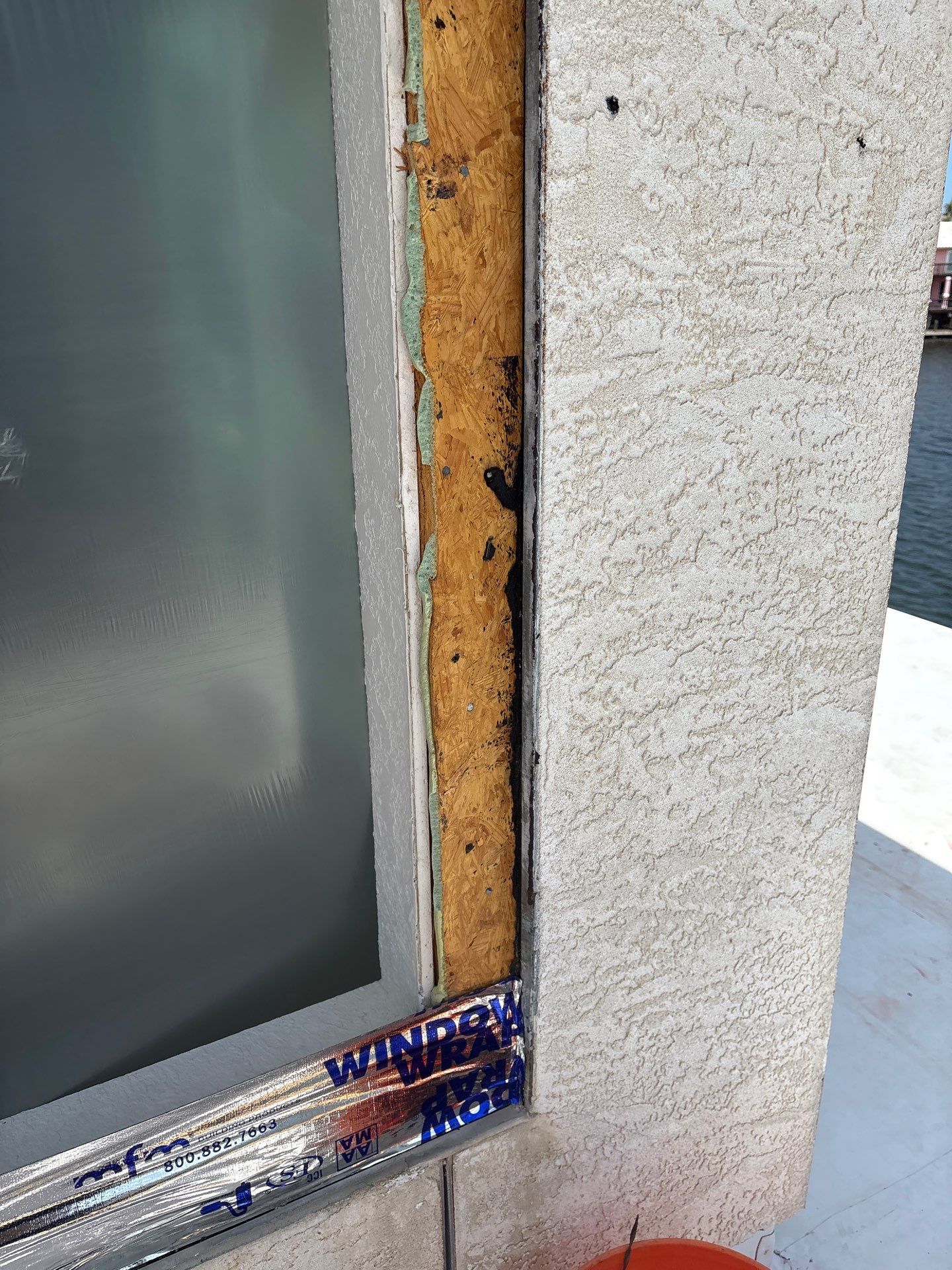 Installing Windows on a Submarine  by Bayfront Roofing and Construction