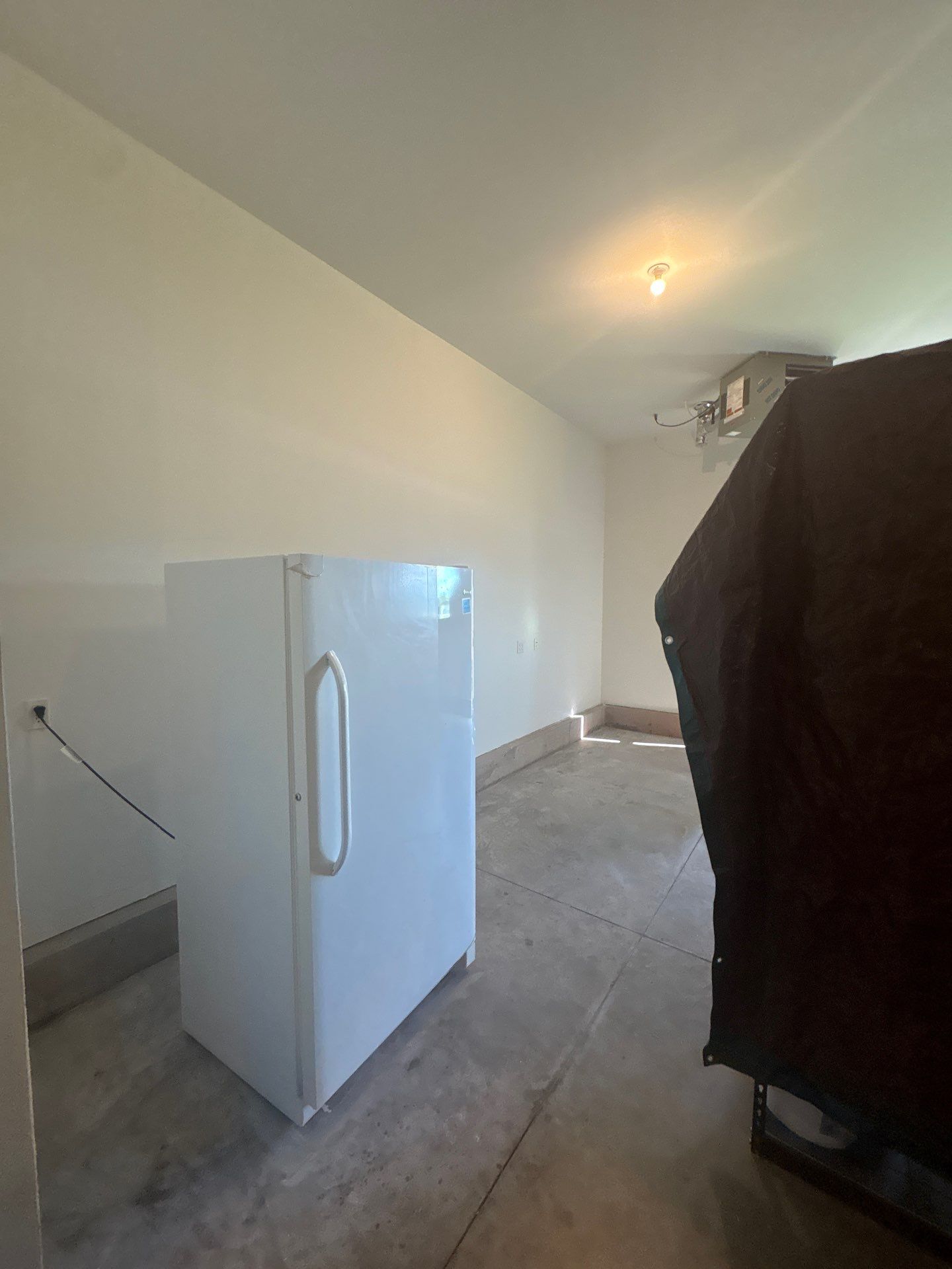 Full Garage Interior Drywall Finishing and Priming in Sioux Falls by Select Painting, Coatings & Garage Cabinets