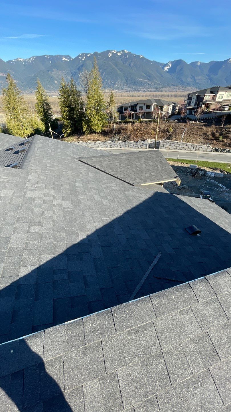 Residential Roofing Installation using OC Oakridge shingles by Top Notch Roofing Inc