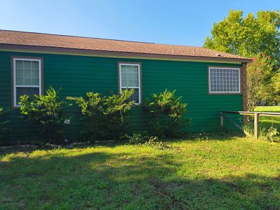 Exterior Painting in Lindale, TX | Bright Green Wood House Repaint