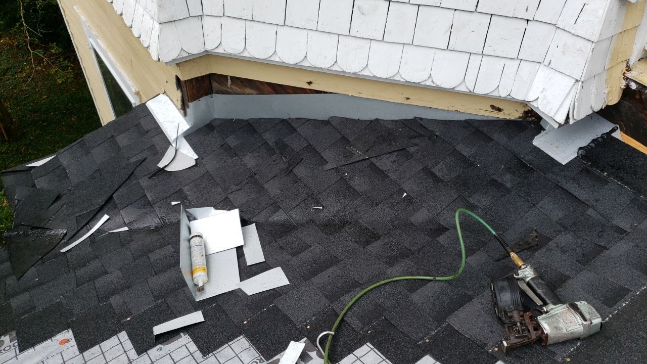 Residential Roofing Installation using Roof Replacement by American Roofing & Construction LLC
