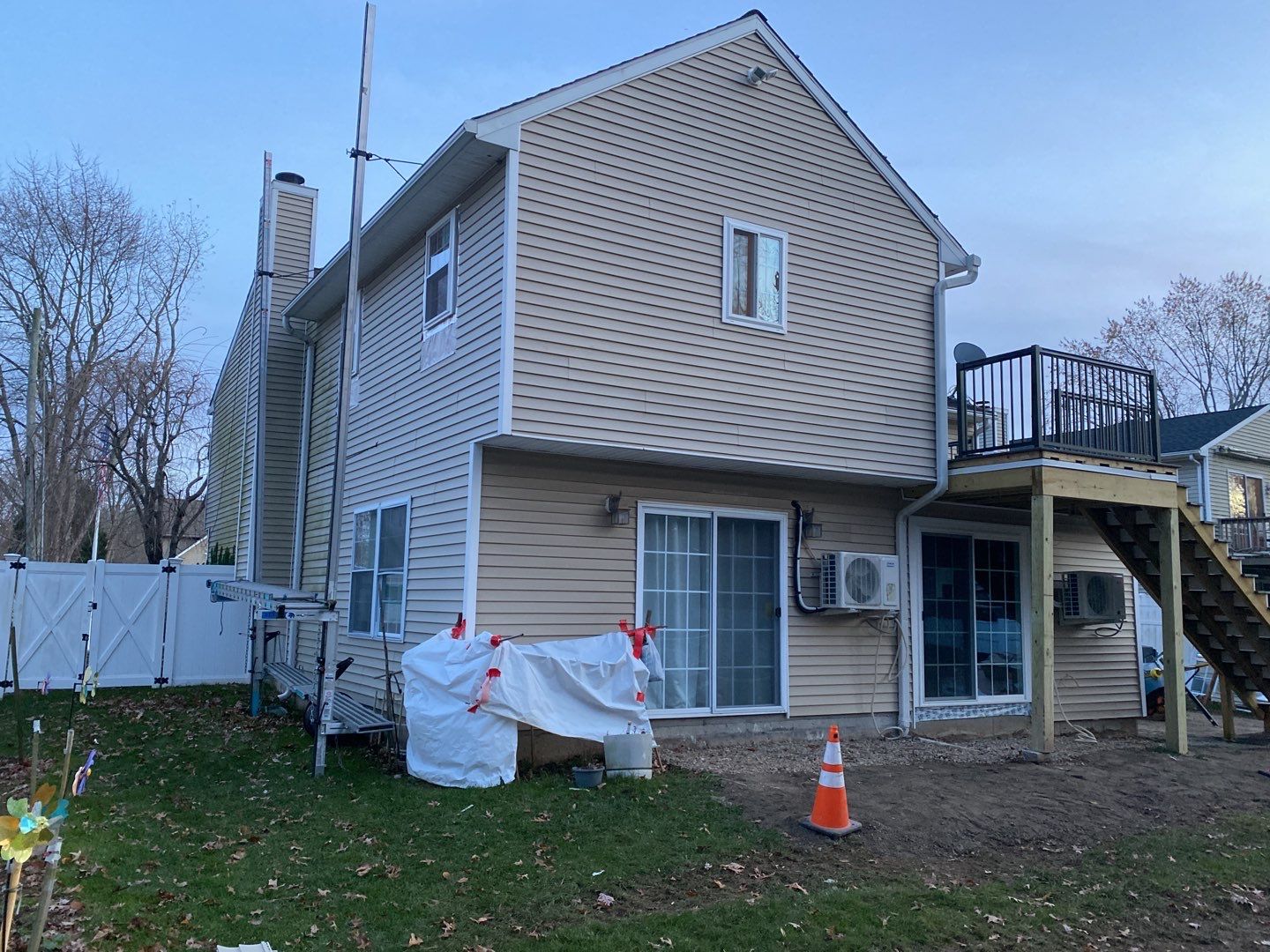 Siding Repair using Certainteed Mainsteet D4 and EPDM roof under deck by A Plus Exterior