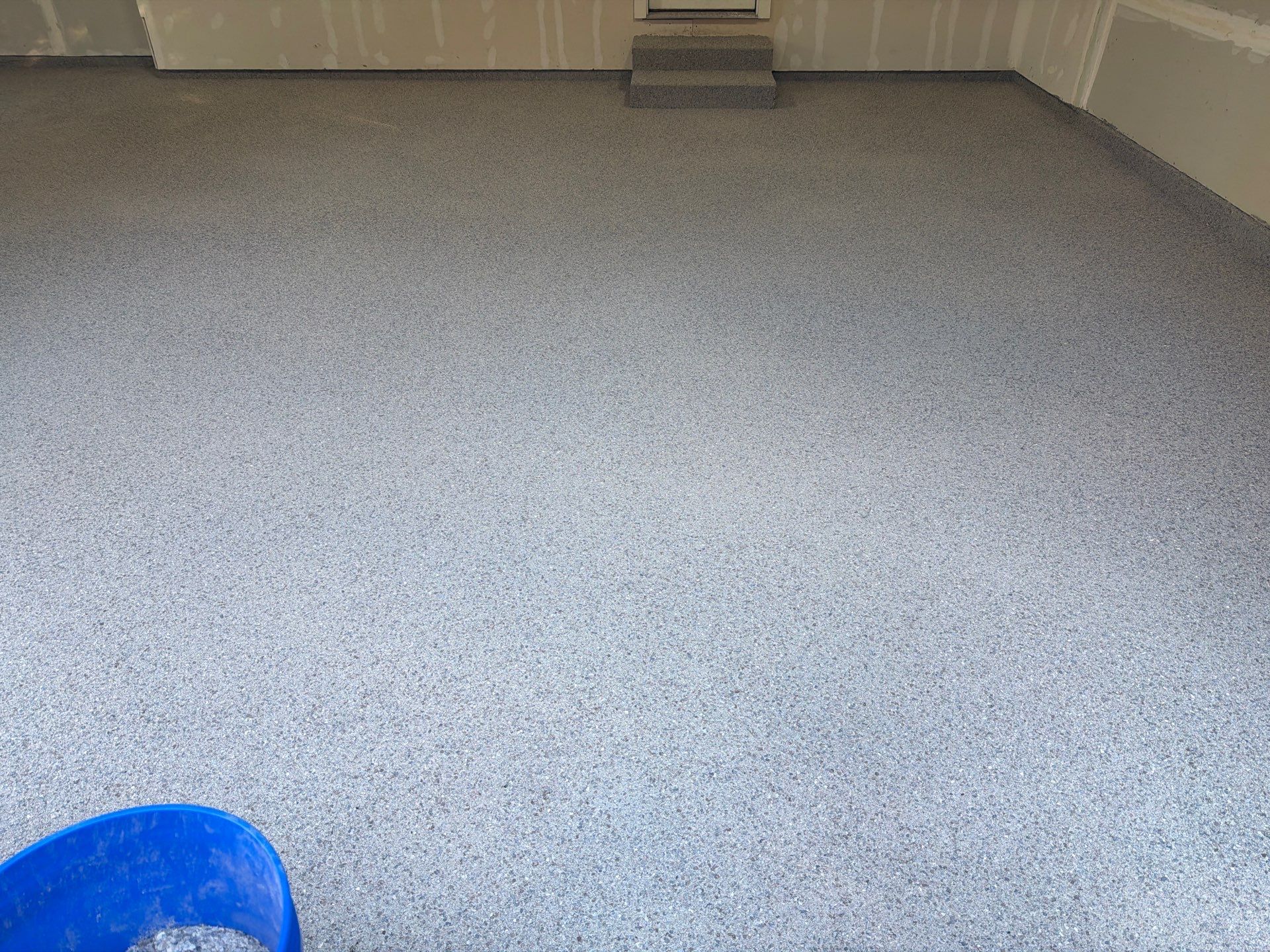 Hudsonville Garage Renovation Featuring Finished Drywall and Flake Epoxy Floors by Gordon Painting
