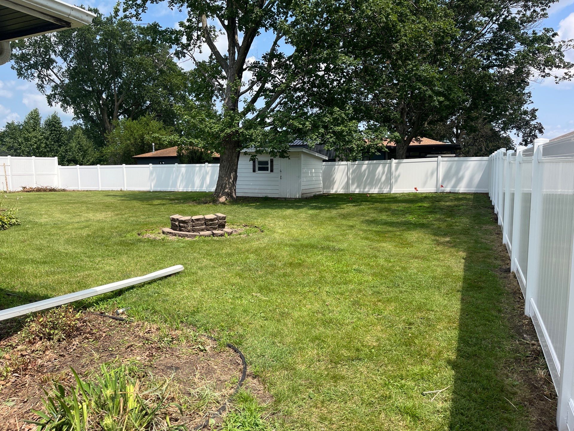 White Vinyl Privacy Fence Installation in Cedar Falls by Perfect Picket Fence and Stain