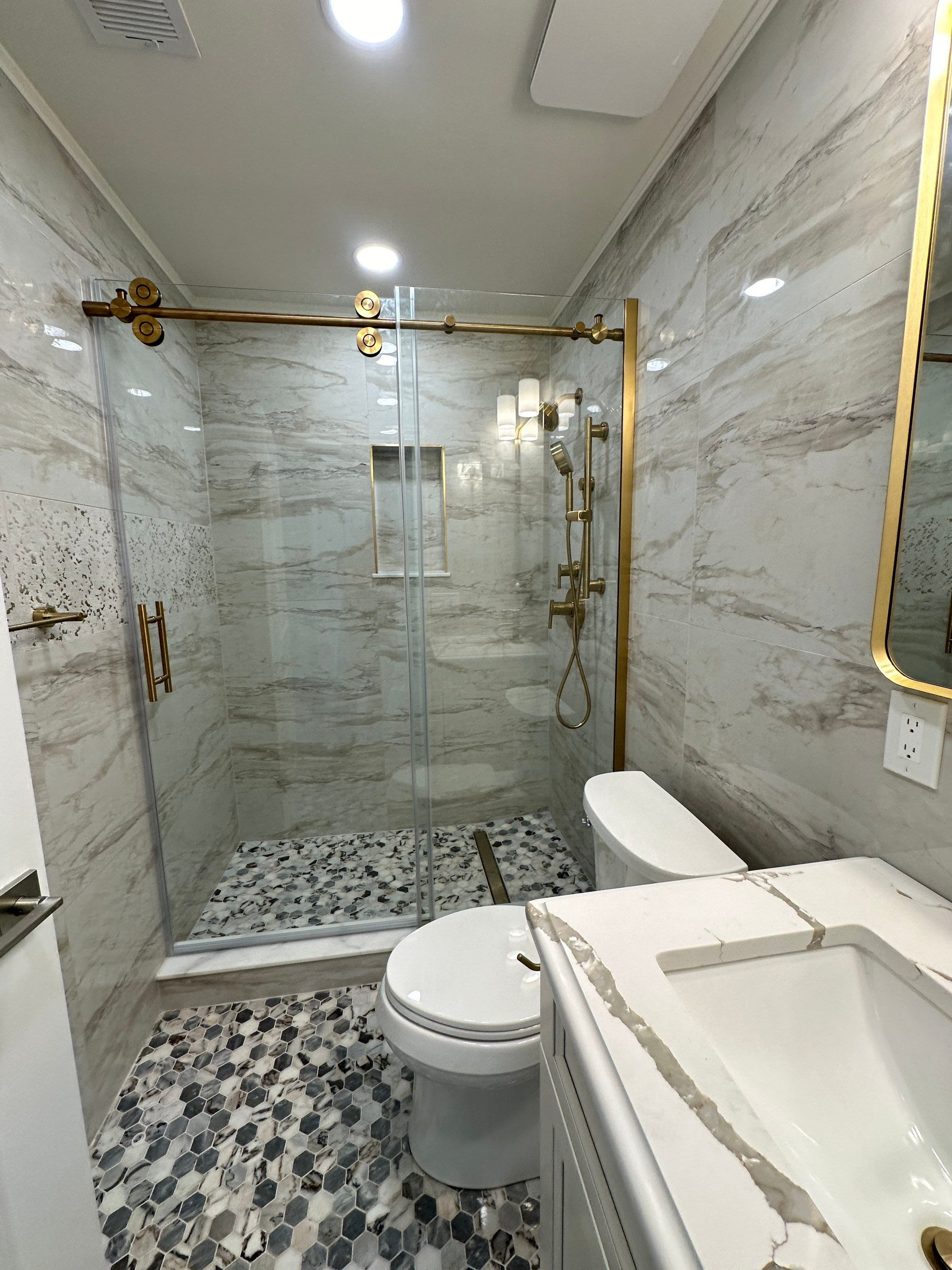 Bathroom Remodel using Tile by Home Concepts Construction