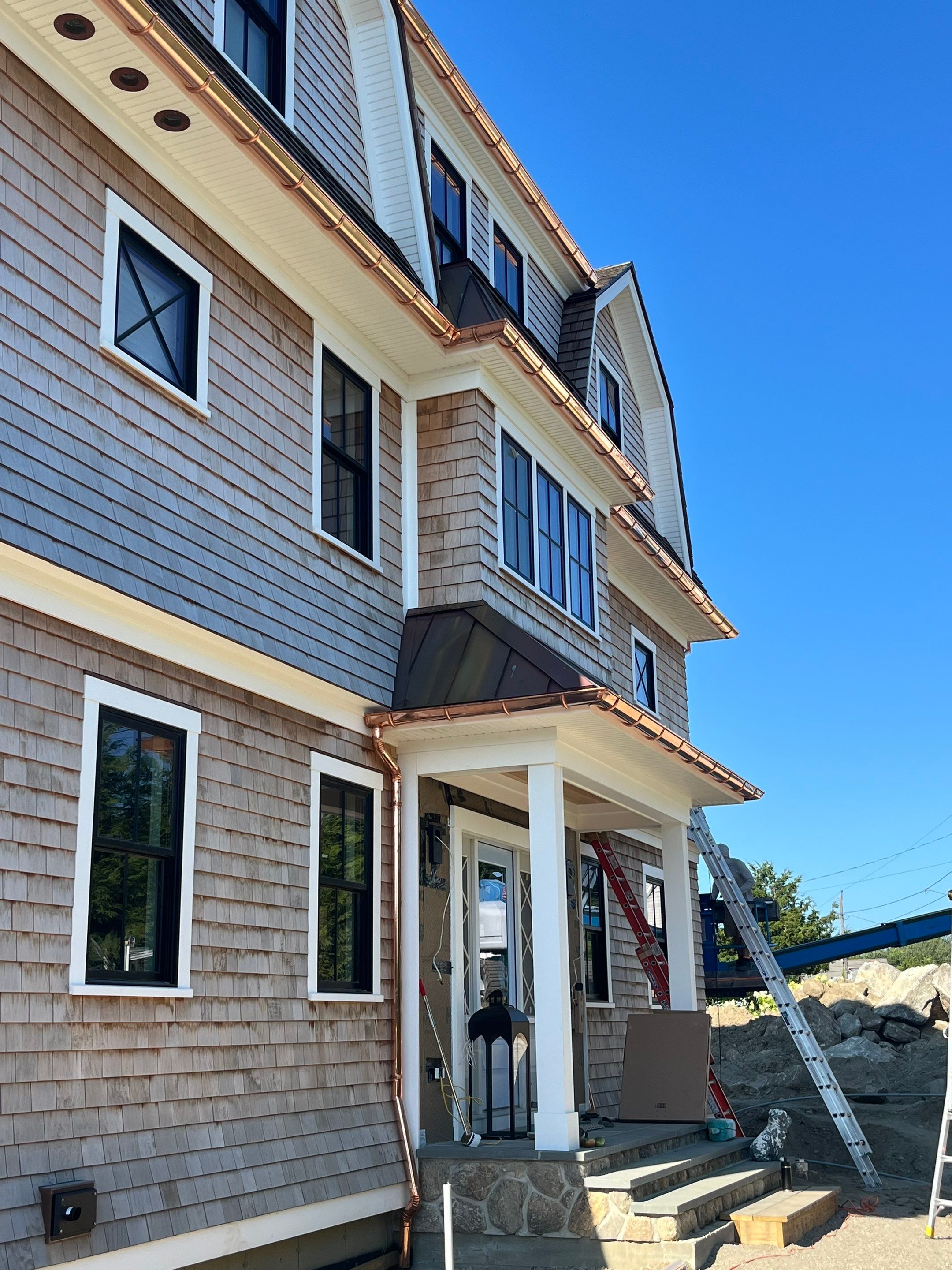 Great Island - Red Cedar Roofing, Yellow Cedar Siding, Standing Seam Copper, & Copper Gutters by Rinaldi Brothers