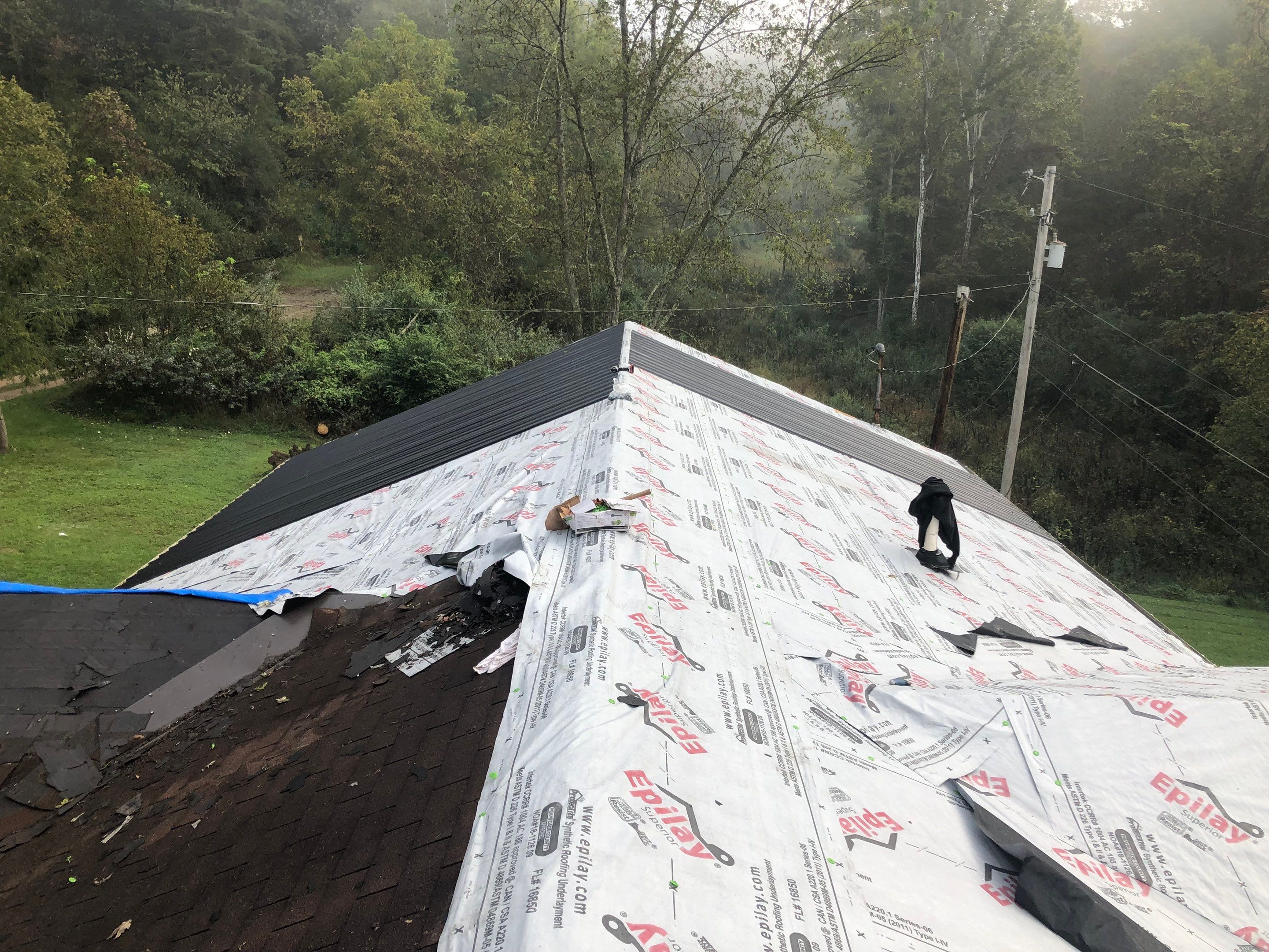 Metal Roof and Vinyl Siding, Soffit, Gutters using LifeTite Premium metal roofing  by Secure Construction Company Inc