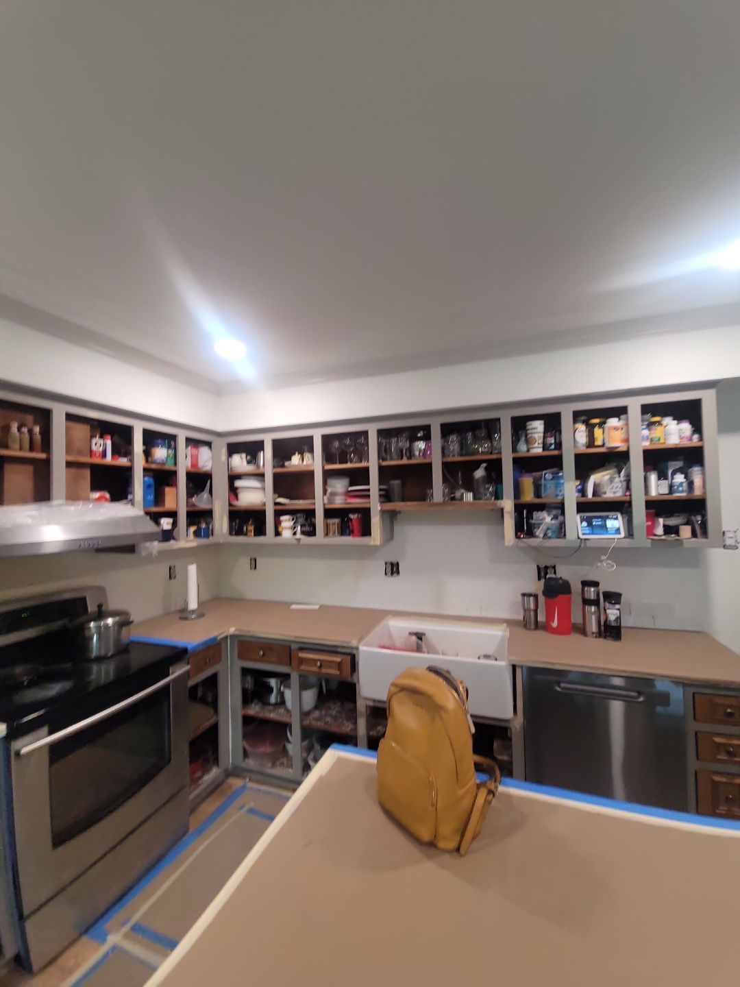 A Pathway to Personality – A Two-Tone Kitchen Transformation in Apex by Elite Remodeling and Design LLC