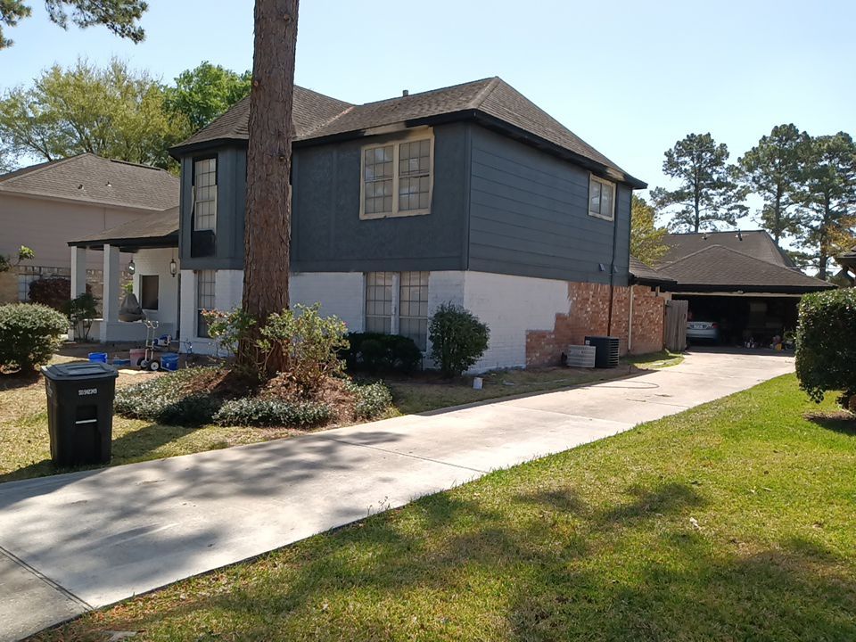 Interior and exterior painting project by Roof Concepts Construction
