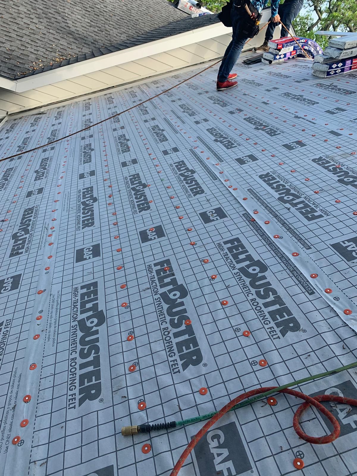 Residential Roofing Installation using Roof Replacement by American Roofing & Construction LLC