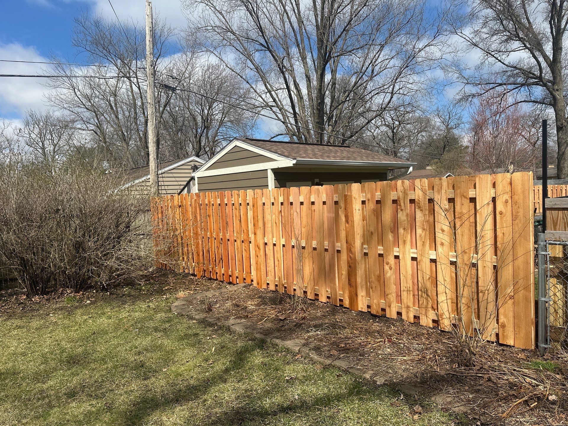 Cedar Privacy Fence Shadowbox Installation in Cedar Falls by Perfect Picket Fence and Stain