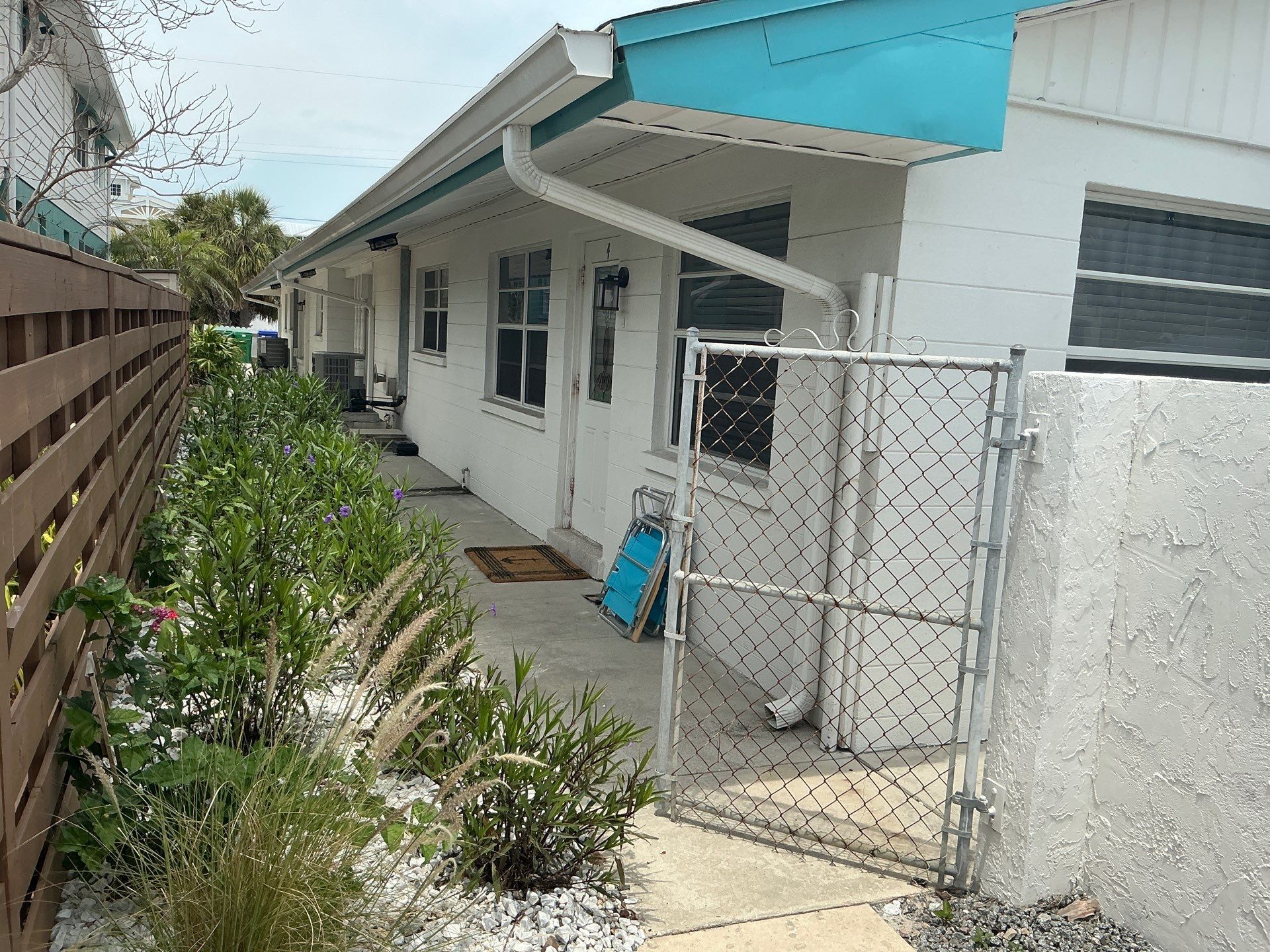 Splash Guard Gutter System and 7-inch Installation in Anna Maria FL by Gutter Professors