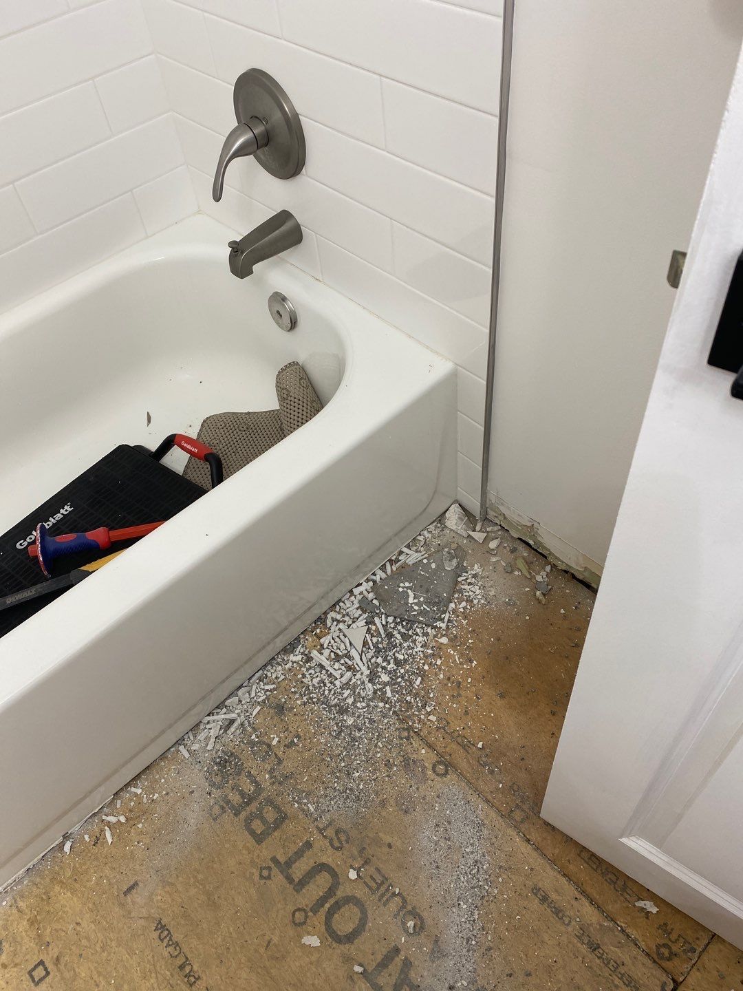 Bathroom Remodel using Two new bathroom design and new floors by Alpha Design Services