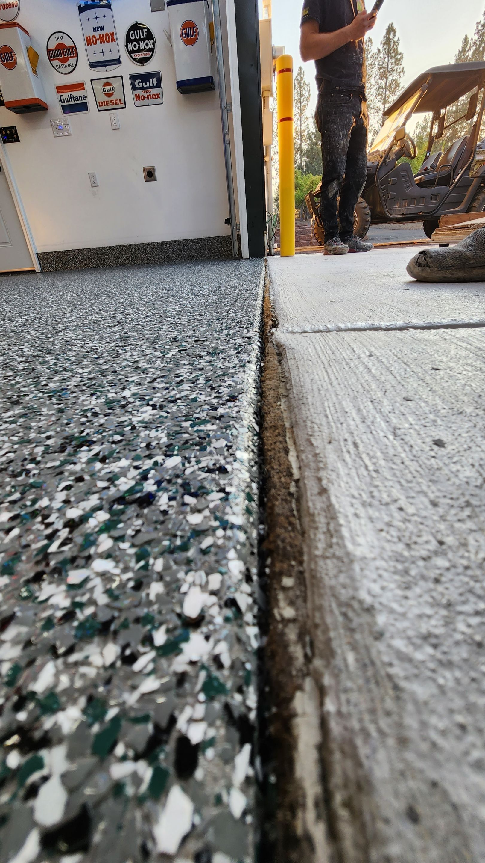 Garage Transformation using Domino with Blue by Croc Coatings, LLC