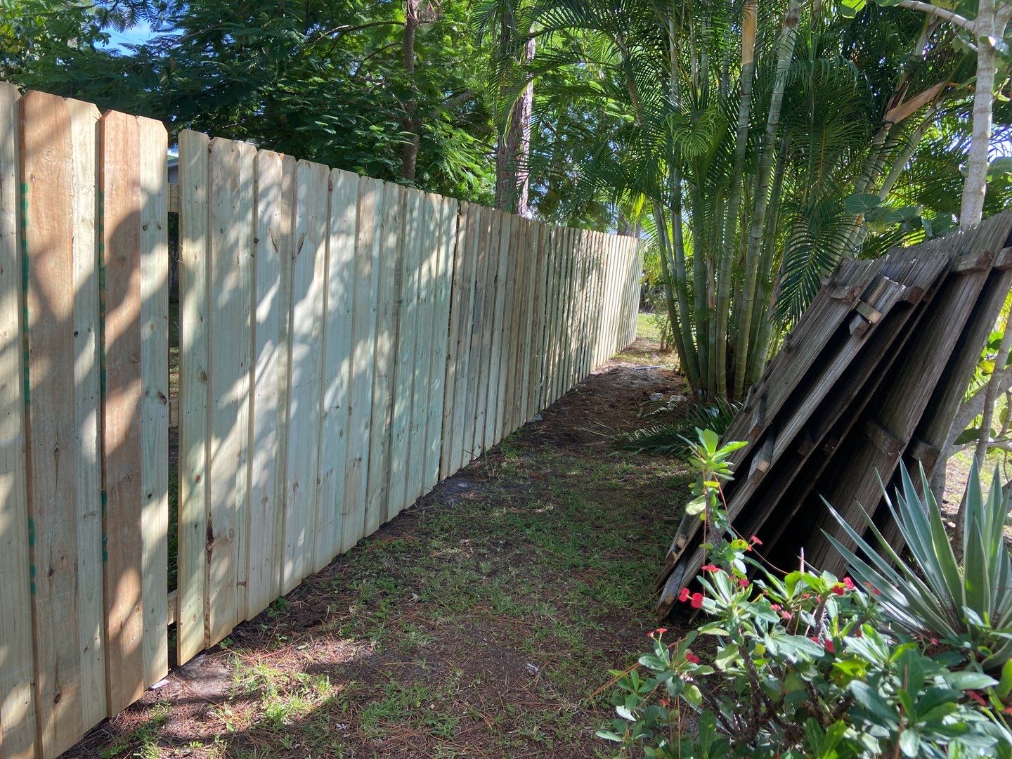 Wood Fence Installation using Board on Board Wood Fence by Asap fence and gates, LLC