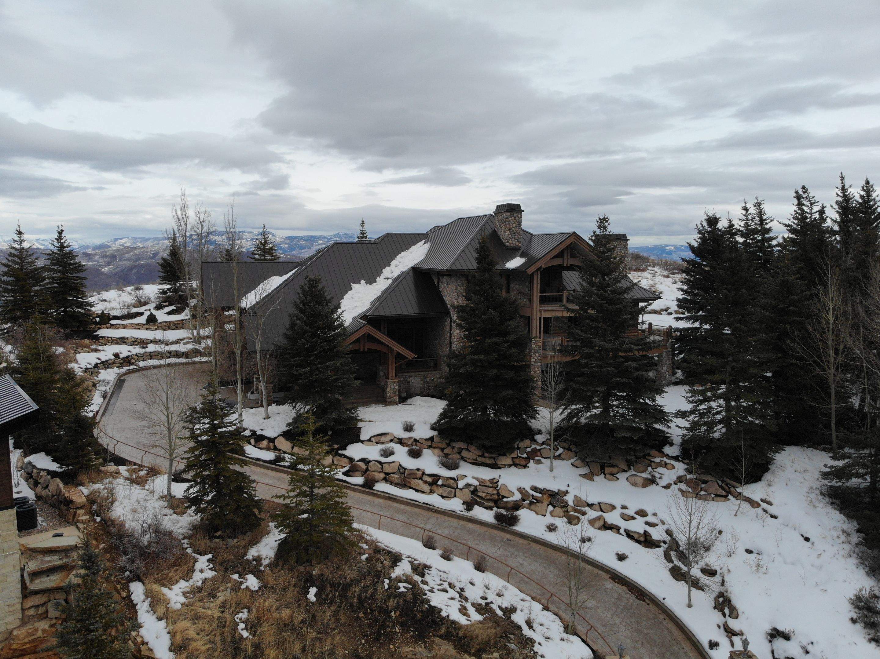 Standing Seam Metal Roof Replacement After Snow Damage by ASAP Roofing & Restoration