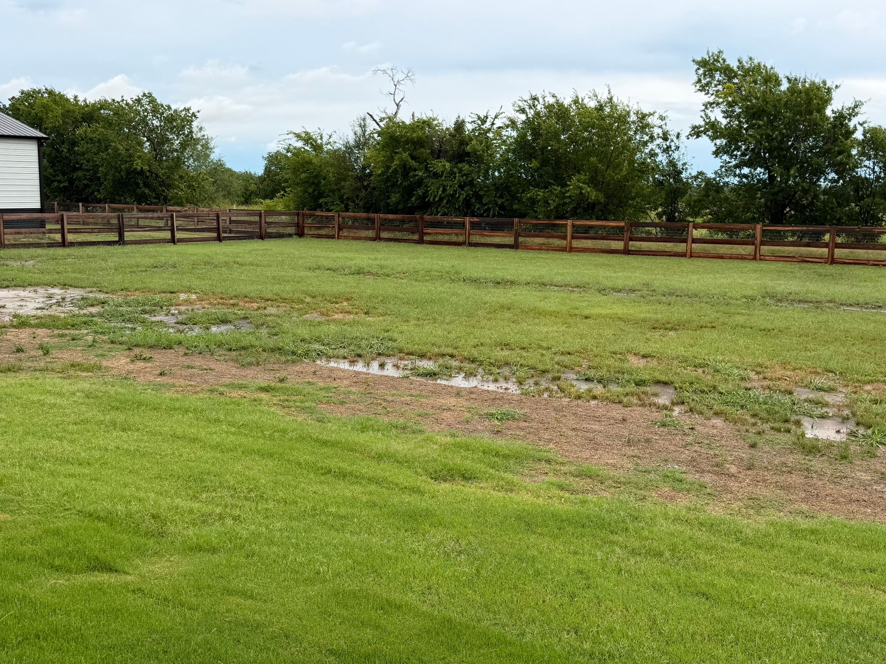 Argyle Residential Landscape Installation with Flagstone Path and Outdoor Seating by Conserva Irrigation NW Dallas