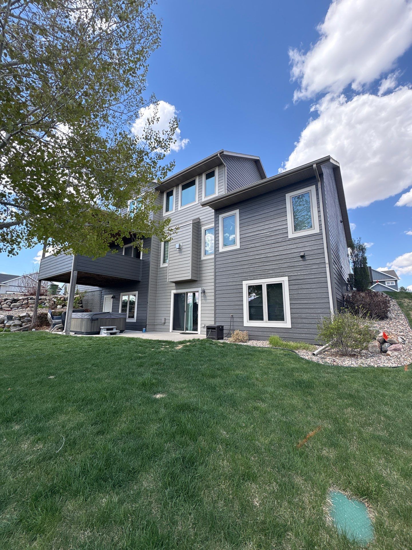Residential Exterior Painting and Color Update in Sioux Falls by Select Painting, Coatings & Garage Cabinets