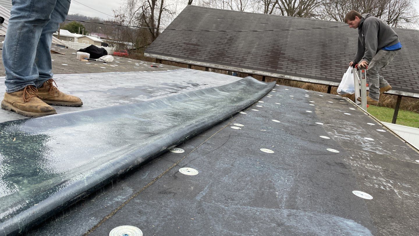 Rubber Roofing  on a residential sunroom by Secure Construction Company Inc