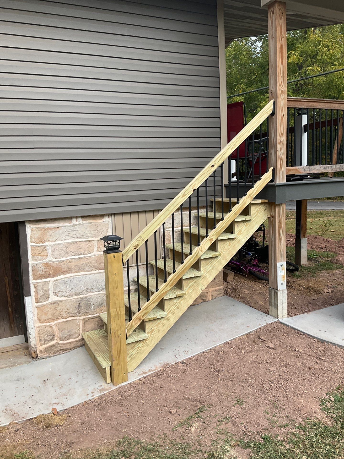 Detached Garage Construction with Vinyl Siding and Metal Roof by Esh Builders
