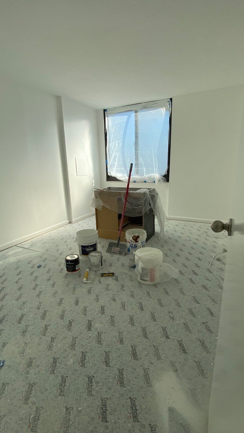 Apartament renovation  using Harwood floor  by Jesus Master Handyman LLC 