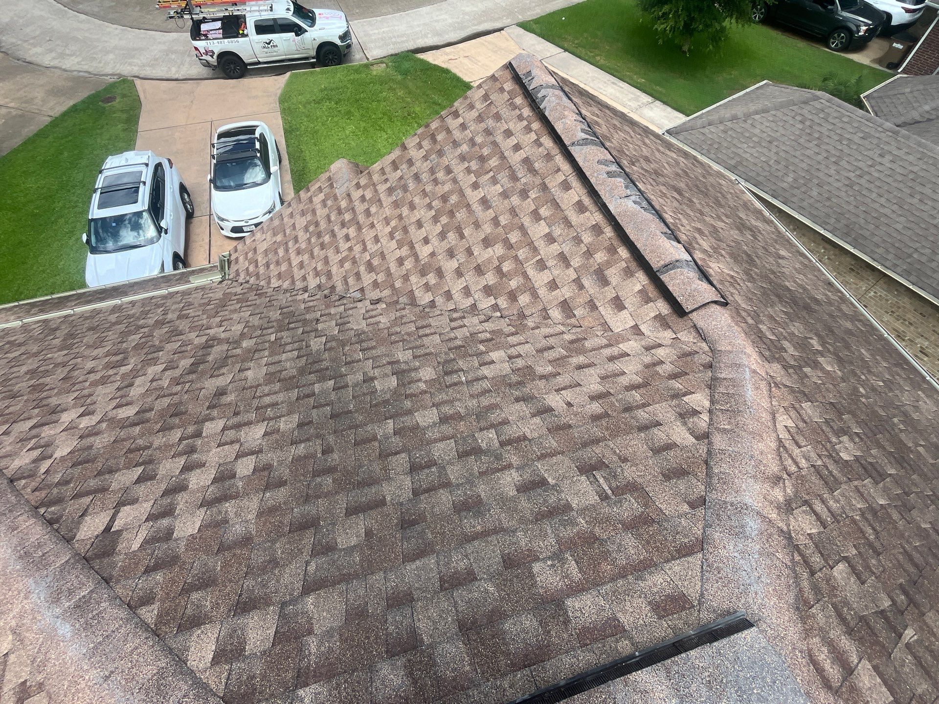 Hail Damage using Owen's Corning Duration (Lifetime) Shingles by Roof Repair Company