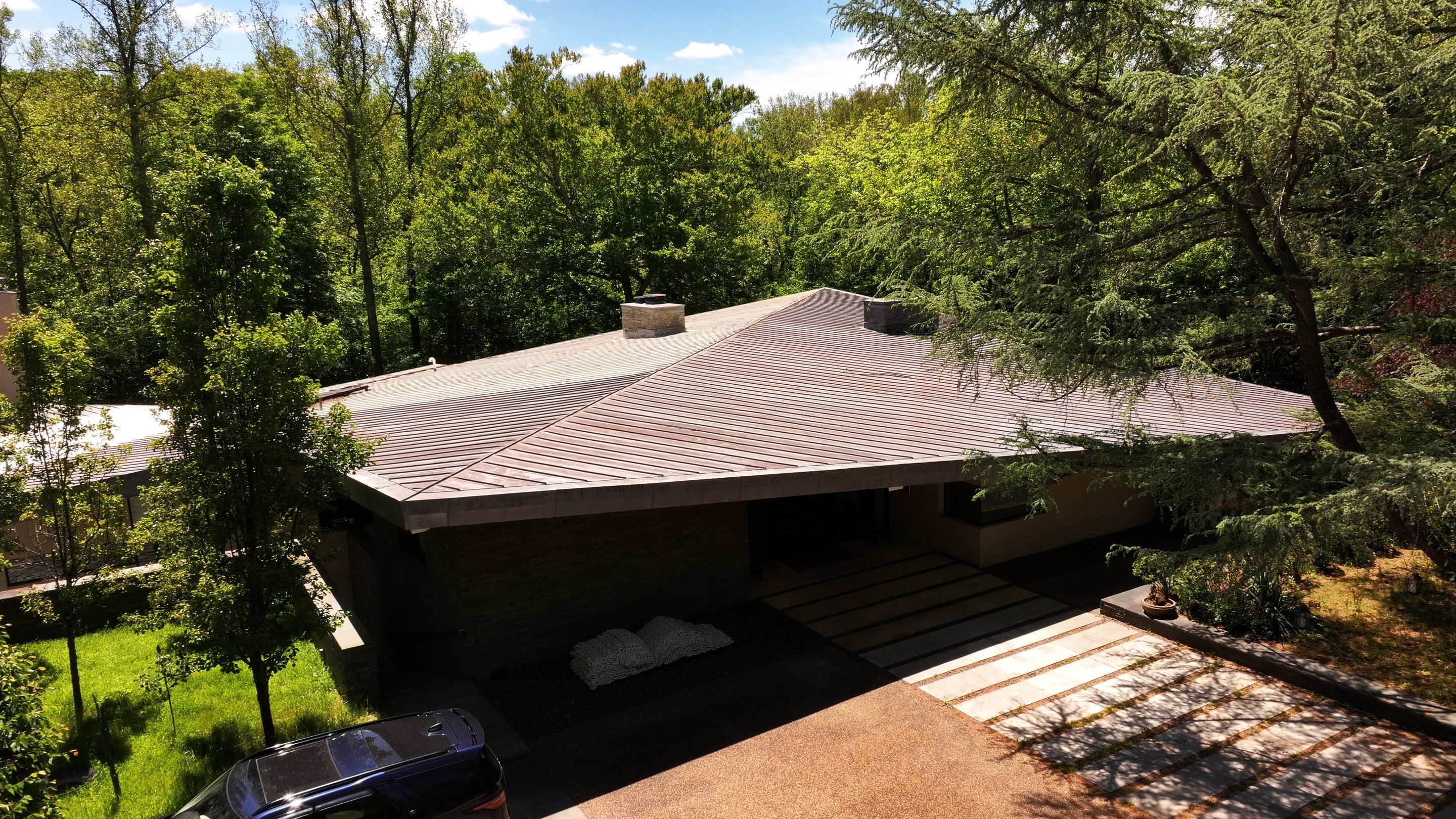 Modern Standing Seam Metal Roof Installation in McLean by American Home Contractors