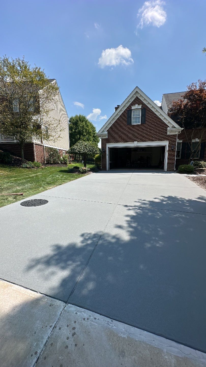 Pool Deck + Driveway + Garage Project in Venetia by Floors in a Day, Inc