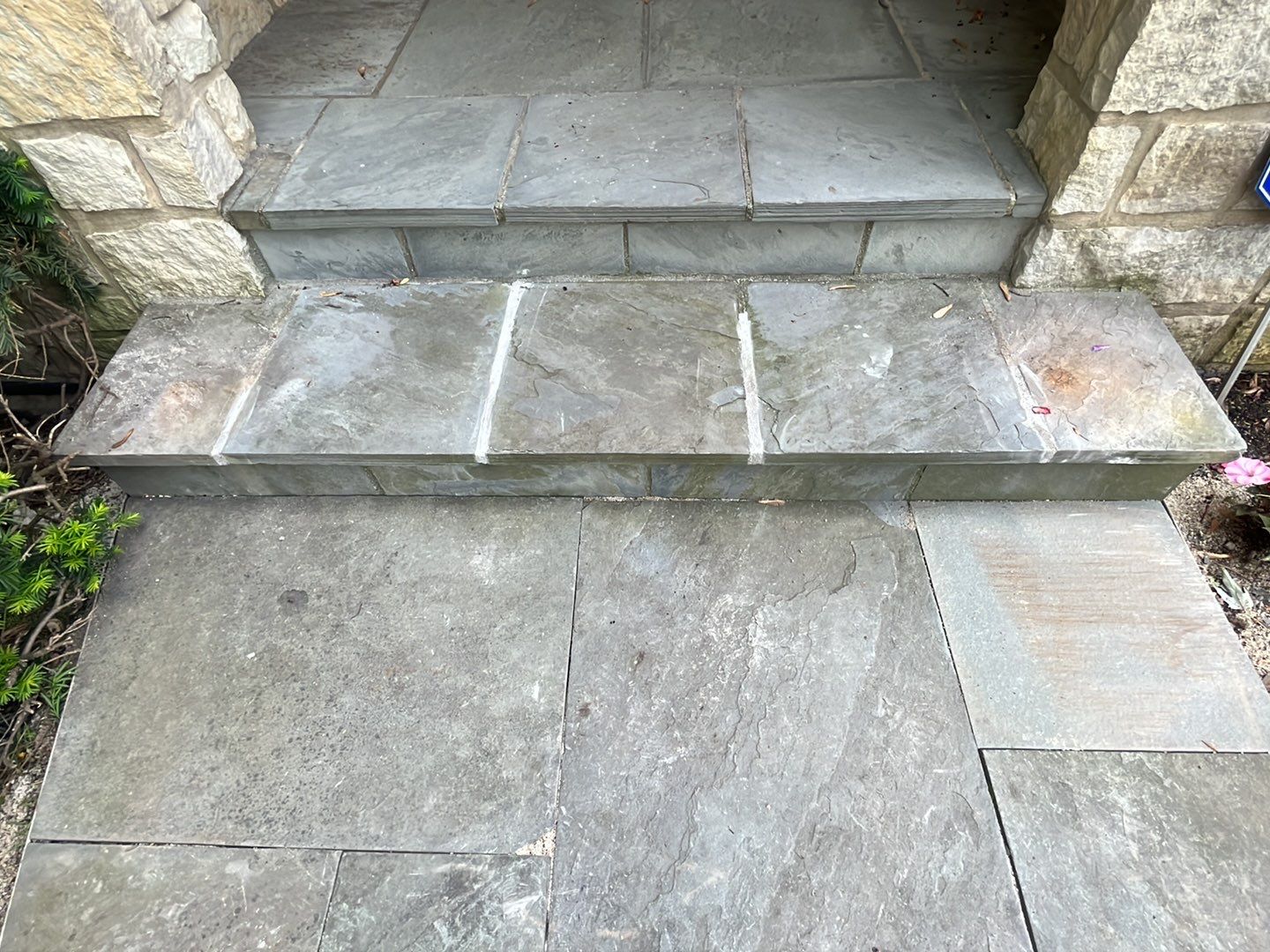 Northbrook, IL stucco home soft wash and stone cleaning by Northern Power Washing LLC.