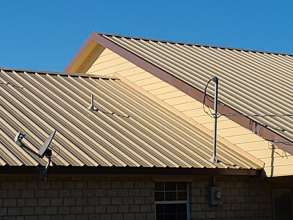 Residential Roofing Installation using PBR Metal Roof by Harvey Roofing & Construction