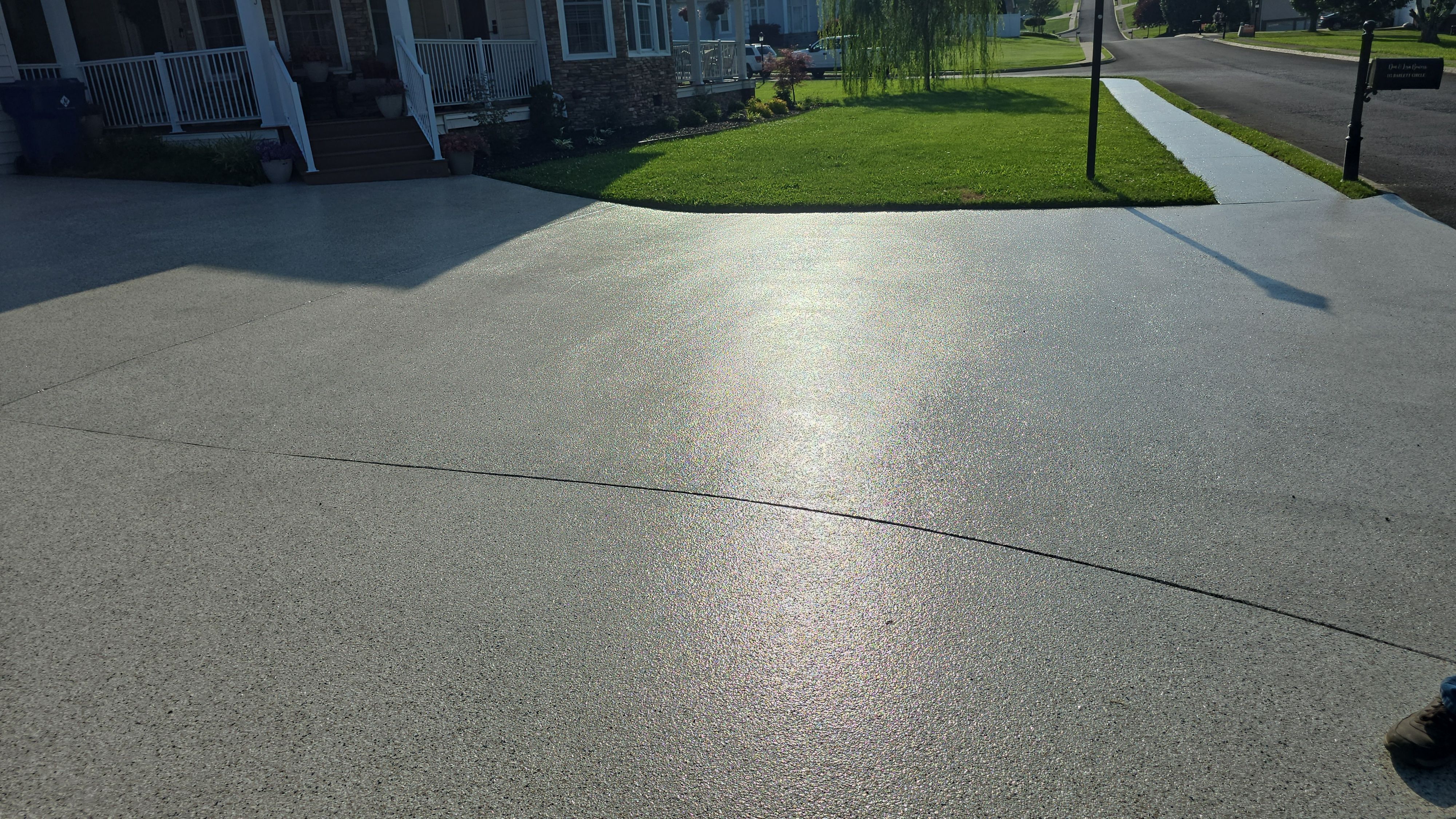 Incredible transformation on Driveway Garage and Sidewalk! by Elite Floor Solutions