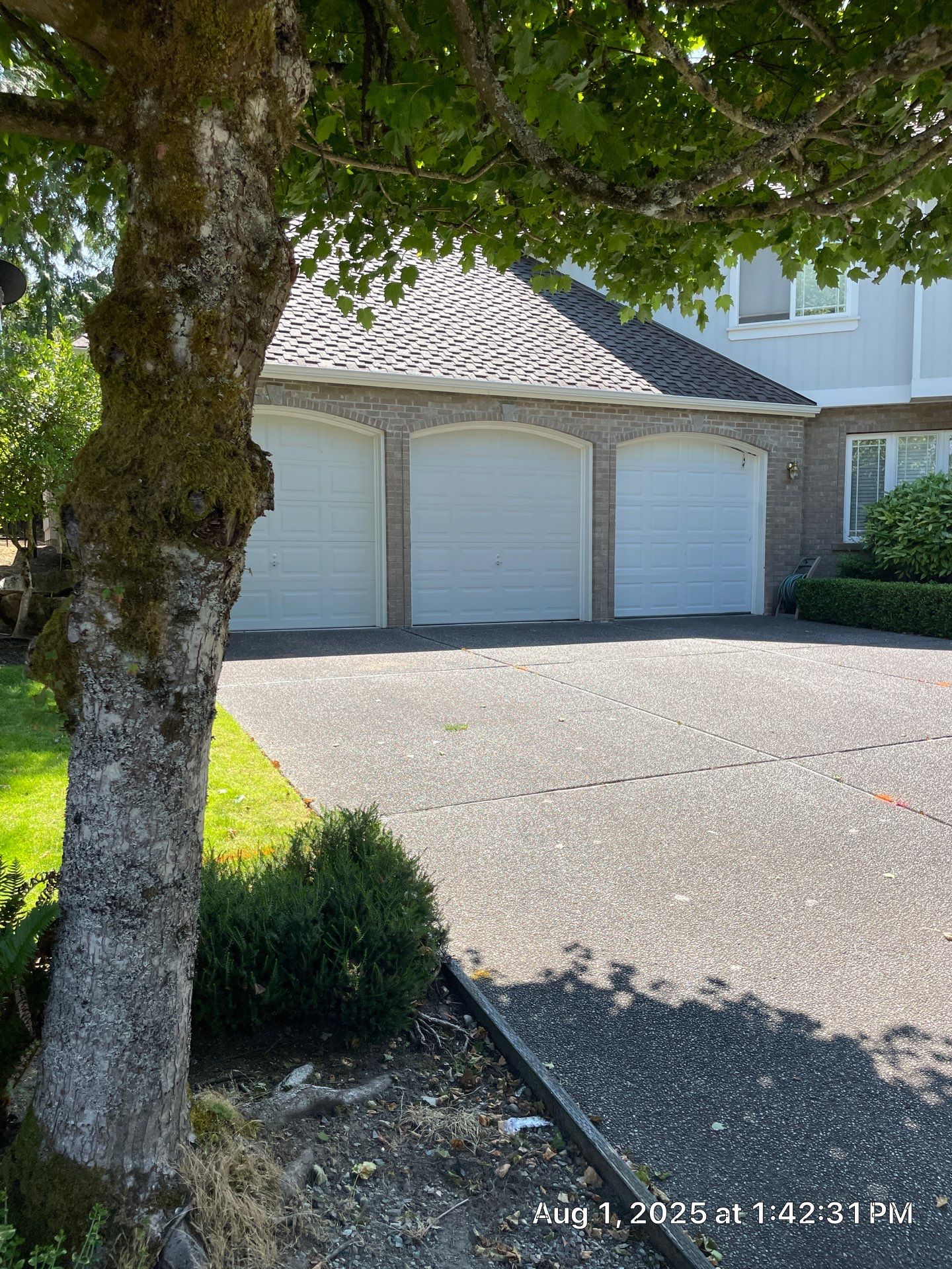 Multi-color Stamped & Sealed Concrete Driveway Renovation | Mukilteo by Jireh Asphalt & Concrete Inc