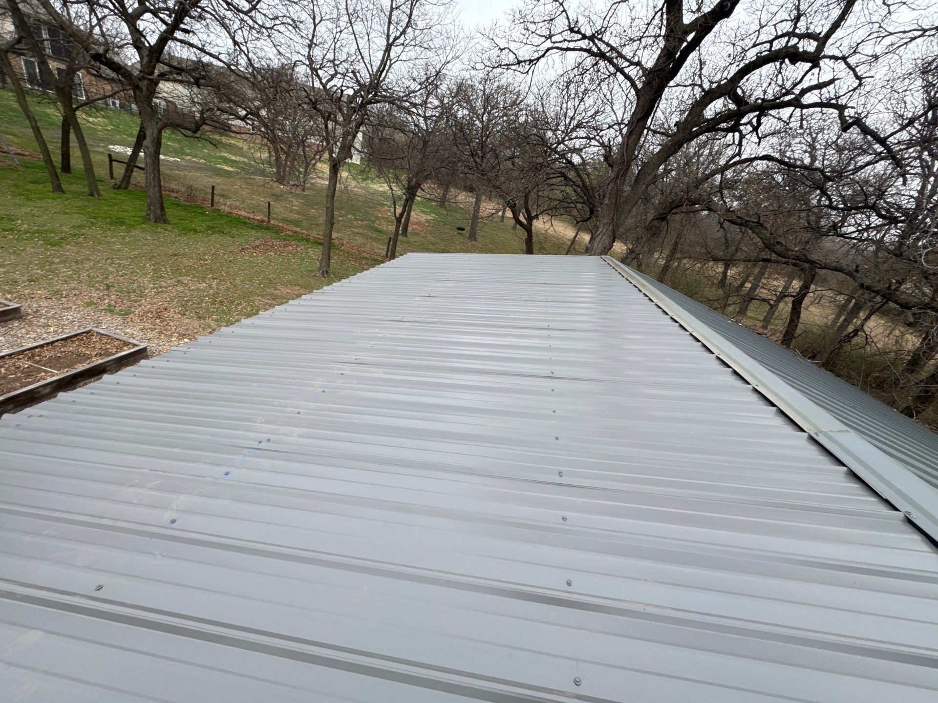 Metal Roof Replacement & Solar Reset in Edmond, OK by 5Coat Roofing & Construction