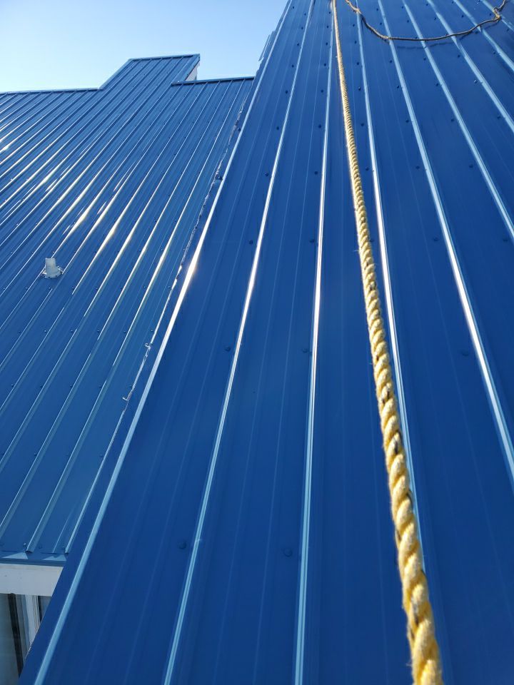 Commercial Roofing Installation using Metal roofing by American Roofing & Construction LLC