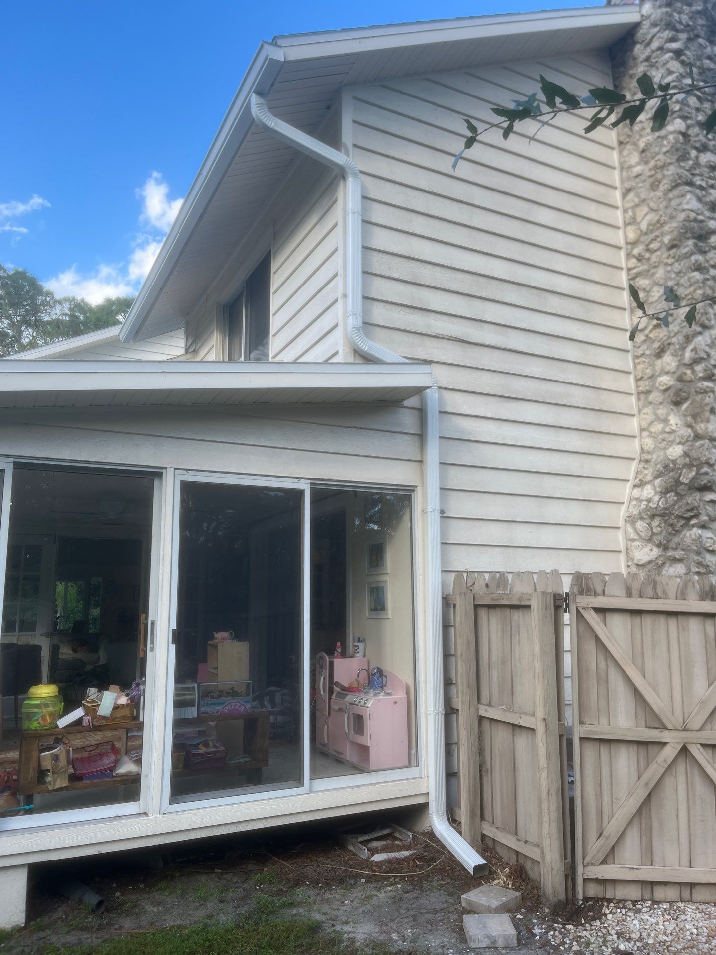 White 6-Inch Seamless Gutters Installation in Sarasota FL by Gutter Professors