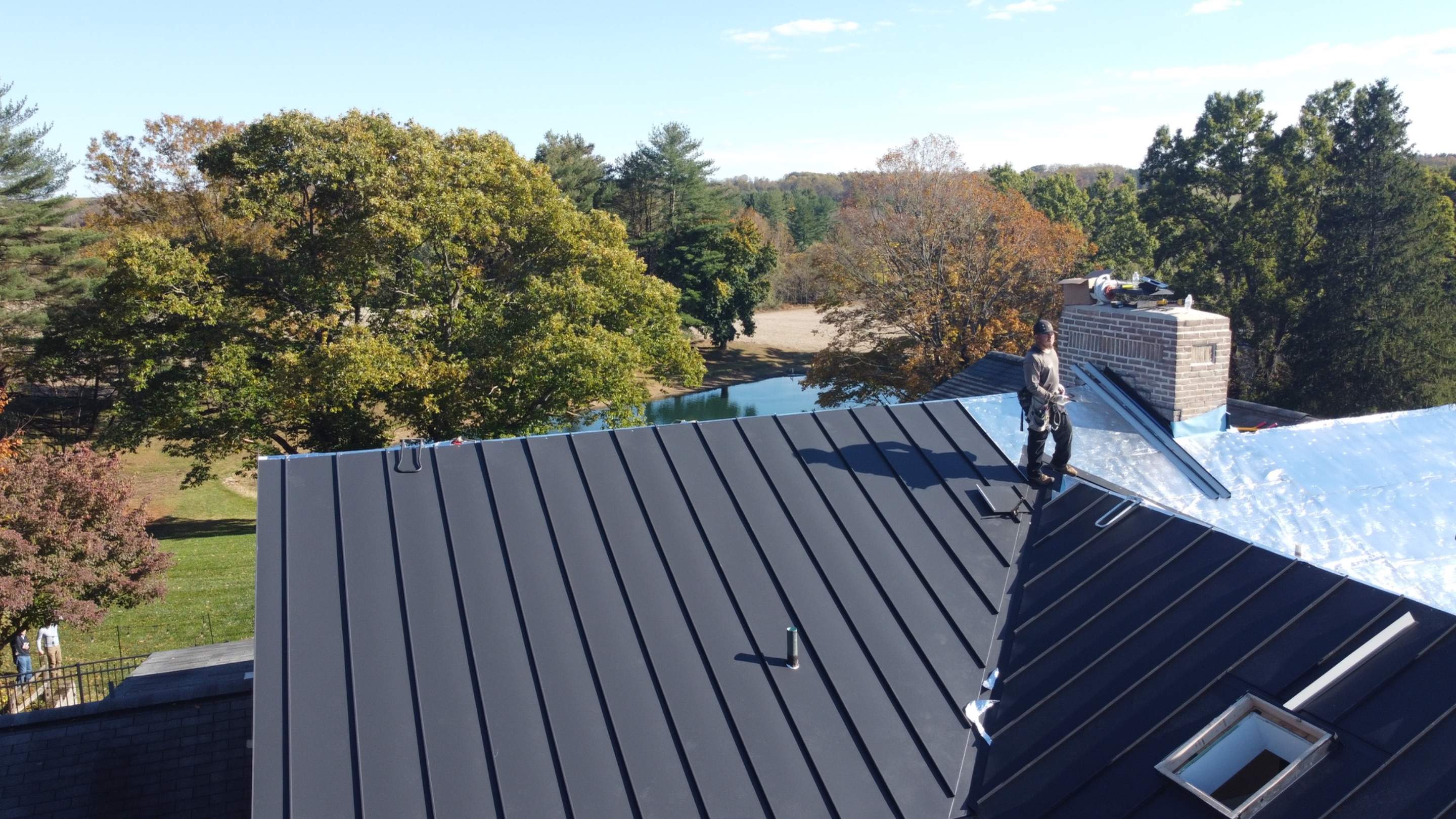 Residential Roofing Installation using Standing Seam Metal Roof | Mechanically Fastened | 24 Gauge by Matter Roofing & Construction