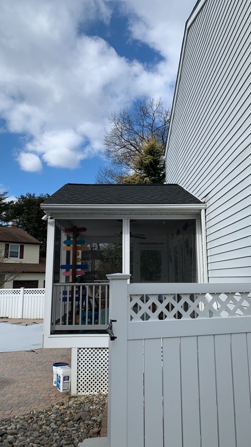 Roof Replacement with GAF Decotech integrated solar panels by American Home Contractors